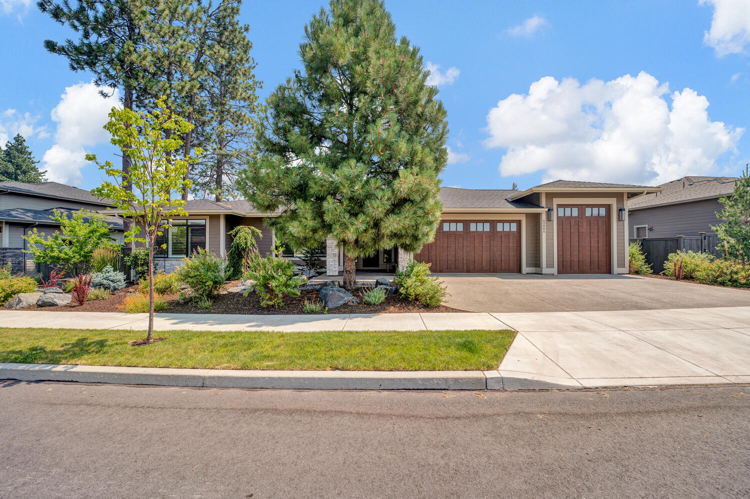 Welcome to River Vale, this exquisite single-level residence is a rare gem seamlessly blending luxury and nature. The meticulously crafted living space offers flexibility and comfort with a bonus room and a flexible fourth bedroom/office. Discerning owners will appreciate the primary suite's separation from the home's social spaces. The highlight of this home is undoubtedly its open floor plan, anchored by a stunning fireplace serving as visual feast and a cozy retreat. The butler's pantry stands ready to assist for all your culinary endeavors in the well-appointed chef's kitchen. The great room flows effortlessly to a covered patio then to a generous sized yard beckoning play and relaxation. The three-car garage stands ready to house your prized recreational accoutrements. River Rim Park is a stone's throw away, offering a gateway to outdoor paradise. Prepare to be captivated by the thoughtful upgrades and owner touches that elevate this property from exceptional to extraordinary.
