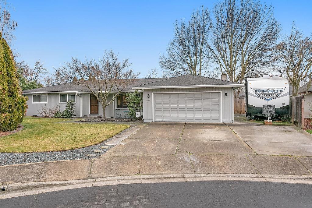 Fantastic E Medford home located in cul-de-sac. This fantastic home features 3 bedrooms, 2 baths, laminate wood flooring, large living room , spacious family room with gas fireplace. Kitchen offers newer appliances, overlooks the backyard and is open to dining area. Large master bedroom w/ sliding glass door that leads out to the backyard wooden deck, attached master bathroom. Great storage, many updates in home. High efficiency, communicating & wi-fi enabled hvac system w/communicating electronic air cleaner installed in 2016. Home exterior was painted in 2017. Large fenced back yard with 2 newer wooden decks, mature landscape w/ newer sprinkler system, raised garden beds w/drip and 2 outdoor wooden sheds. Great side yard for your storage needs. Attached 2 car garage with shelving and cabinets. RV Parking. Great location near Asante medical center, school & parks. Move-in ready.