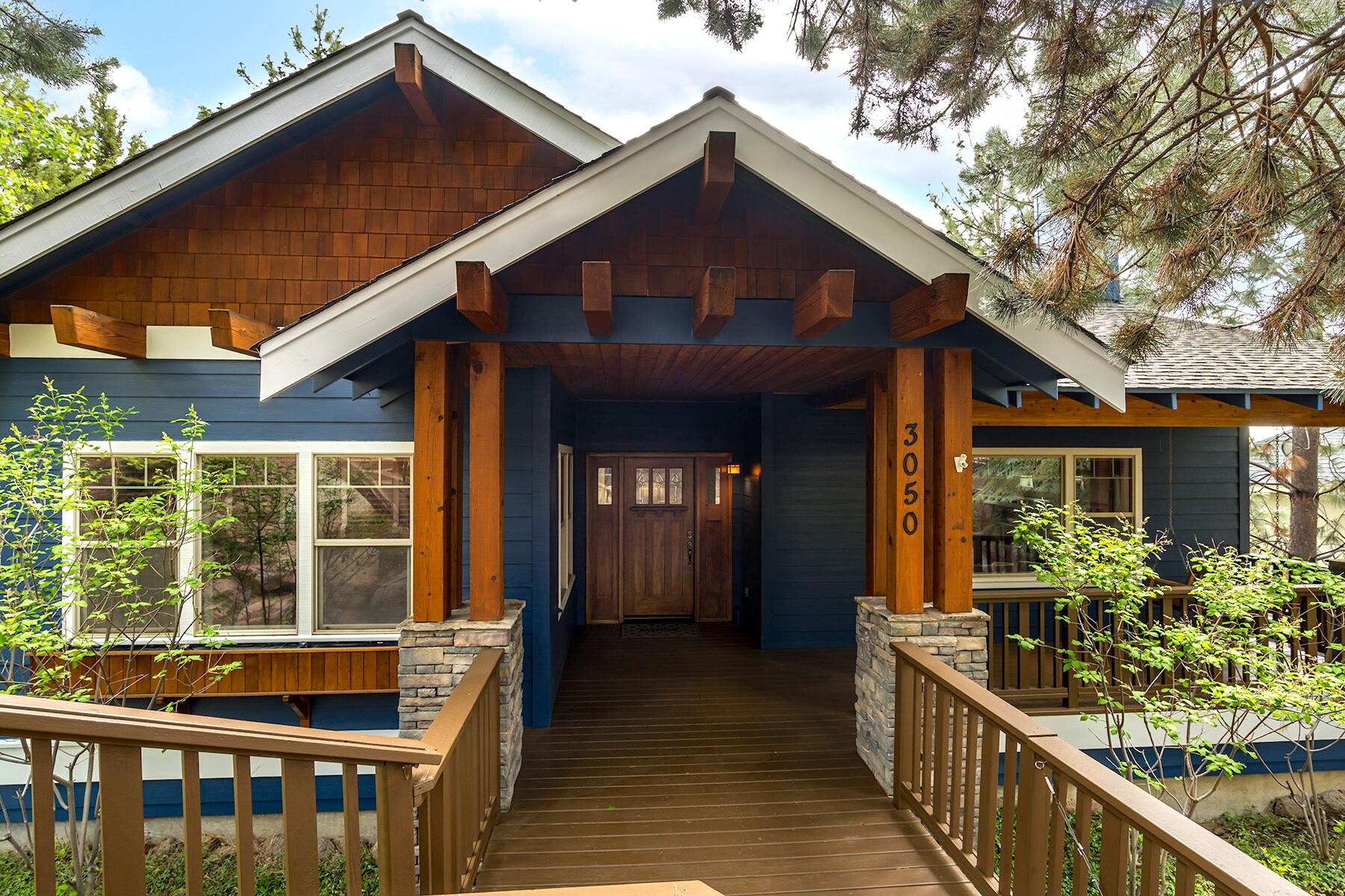 Quality built Craftsman home on Awbrey Butte, offering three bedrooms plus a dedicated office, separate bonus room, and easterly butte views. The main level showcases thoughtful design with kitchen, primary bedroom, living room, and an office/den flowing seamlessly. The front deck is a great spot for morning coffee while the elevated back deck is perfect for unwinding and views of Fourth of July fireworks. You will find quality craftsmanship throughout with solid wood floors, exposed beams, and custom built-in cabinets. The living room boasts vaulted ceilings, a cozy gas fireplace with stone accents. The kitchen features solid alder wood cabinets and stainless-steel appliances. Downstairs are two additional bedrooms, utility room, and versatile bonus/media room. An oversized garage offers ample storage. New exterior paint including front and back decks. Experience Awbrey Butte views, craftmanship build, and comforts of main level living.
