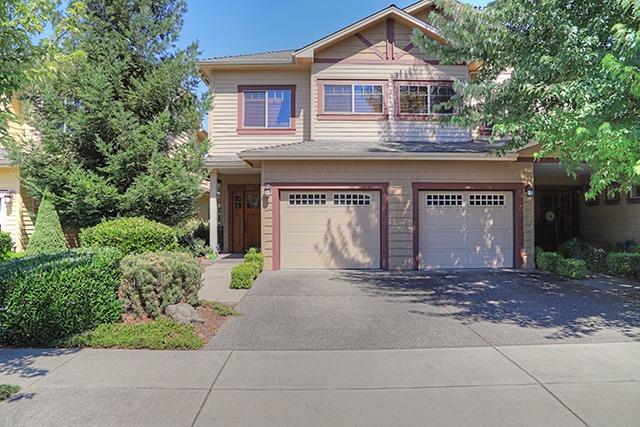 Located in the popular Sequoia Village, this contemporary Craftsman style townhouse features engineered hardwood & tile flooring, granite counters and a casual eating bar in a kitchen with stainless steel appliances. 2 Master suites upstairs, one with a balcony. Quality upgrades in hardwood flooring, granite counters, tile, etc. Finished single car garage with door openers. Additional feature of this property is the spacious club house with pool and large hot tub. HOA fees include exterior maintenance and front yard care. Close to a city park and school. Come enjoy the good life!