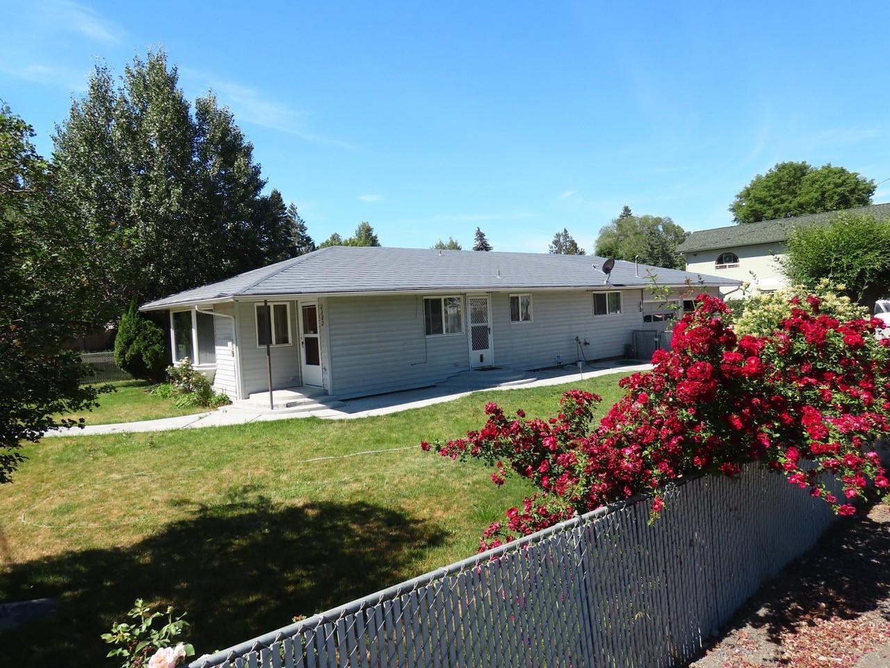 This lovely home has a very nice, large sunroom.  It is accessed via a sliding door in the living room.  The square footage of the sunroom is not reflected in the homes overall square footage. The home has a newer furnace and tankless hot water heater. You will love the extra storage and shed space.  It is a corner lot and well fenced.  The garage actually faces Sturdivant.