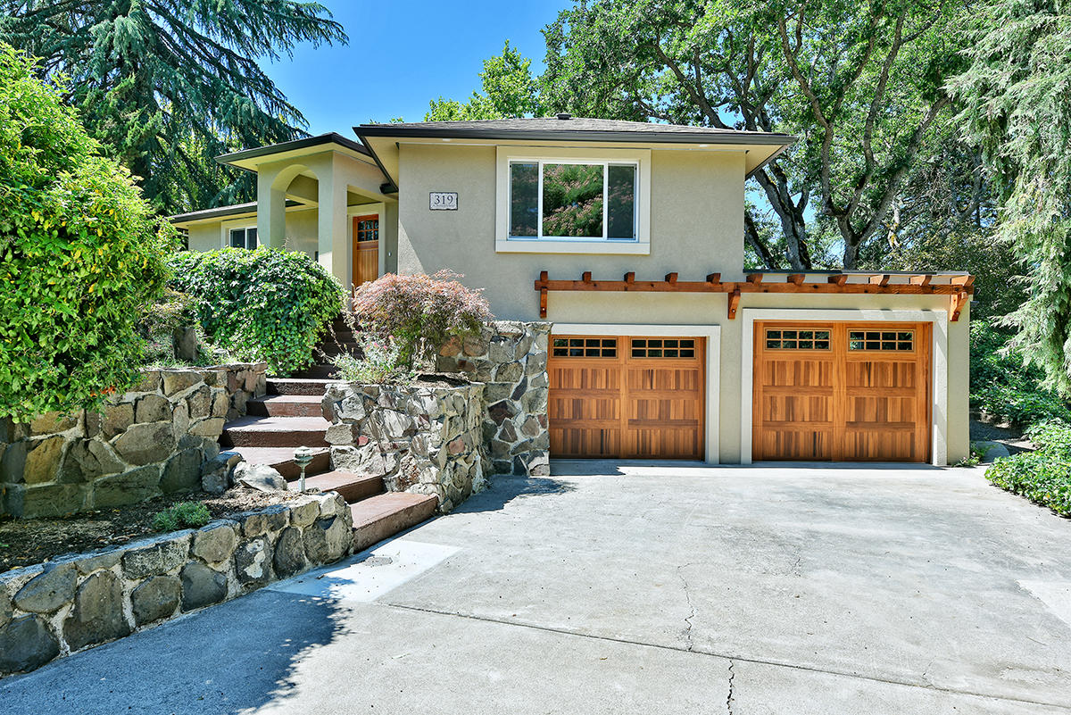 Stunning completely updated home in desirable East Medford! 3BD/ 2.5 BA + a bonus room w/ wet bar. Main level features a stone accent fireplace, canister lighting, builtins, & plenty of light! Kitchen boasts granite countertops, stainless steel appliances, accent lighting throughout & quaint dining room w/ built in bench. Main level master suite w/ its own private corner, stone accent fireplace, access to the new beautiful wood exterior deck overseeing the lg backyard, huge walk-in closet, granite counters, & dual vanity. Lower daylight basement features a huge bonus room w/ wet bar, remaining BDRMS & guest bath w/ tiled tub/shower combo. Exterior has an extra long driveway, two car garage w/ beautiful wood accent trellis above garage doors. Quaint front yard surrounded by trees, side patio cement slab perfect for entertaining, & a huge grassy backyard for other outdoor activities. Call us today this property won't last long!