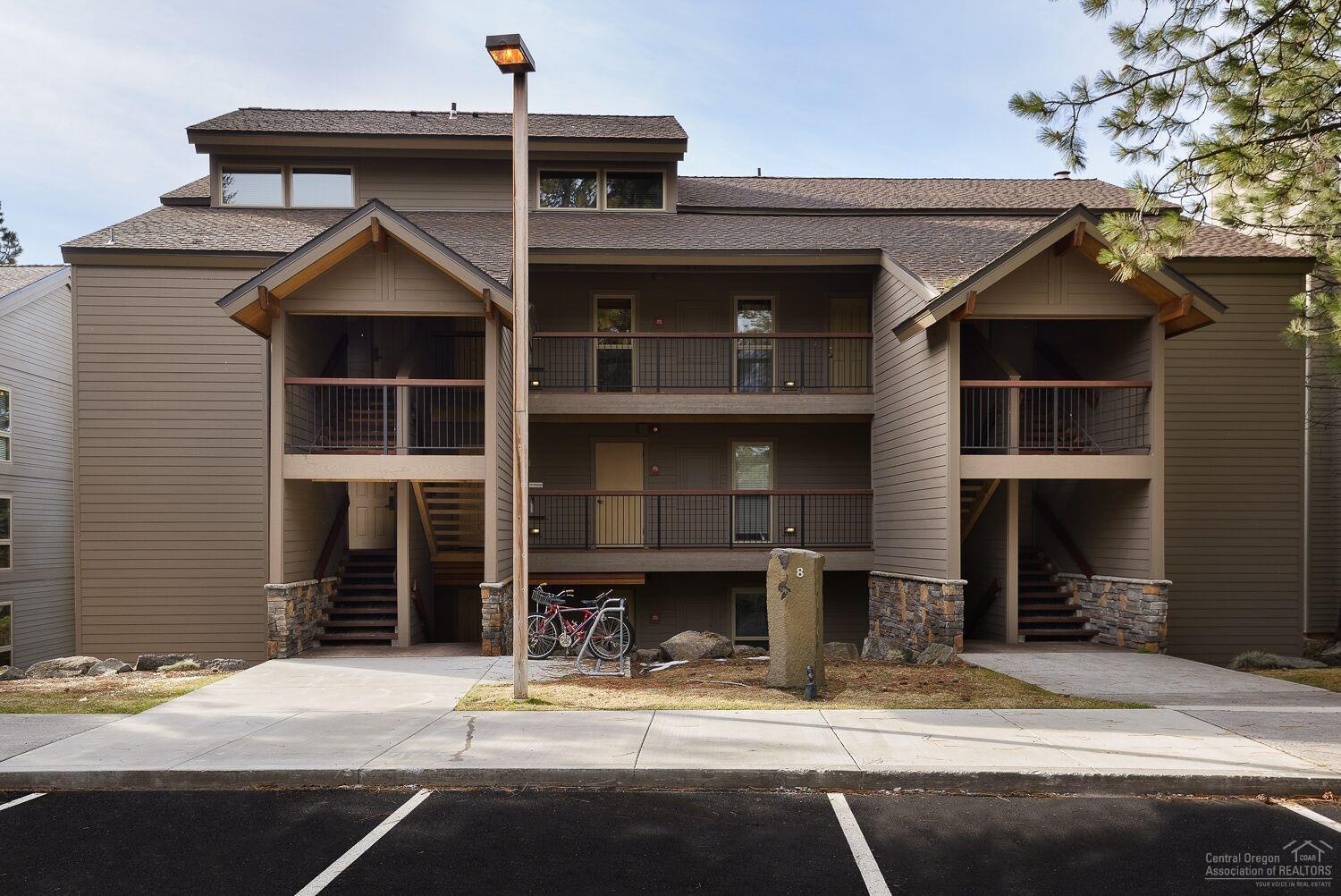 Fantastic condo loft design, updated throughout. Newer kitchen appliances. Tranquil setting with beautiful outlook of the forest and a peek of the river. The Inn at the 7th Mountain is a full service resort. Activities include golf, tennis, parks, pools, horses and winter fun too. Come play in Bend and have a holiday away from home. Or register as a rental through the program at the Inn with Wynn and let this home work for you. HOA covers all utilities, snow removal and exterior maintenance.
