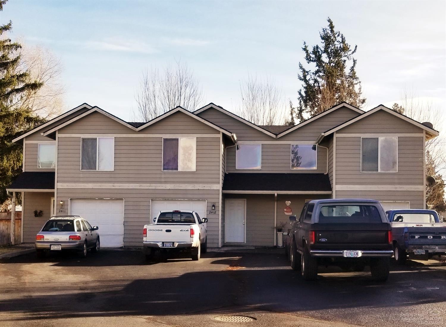 Excellent investment opportunity located in the SW Redmond! Fully rented, low-maintenance Tri-plex with each unit featuring 2 full bedrooms with additional office/den, 2.5 baths, open kitchen, gas fireplace, washer/dryer hook up and single car garage. New roof in 2017!