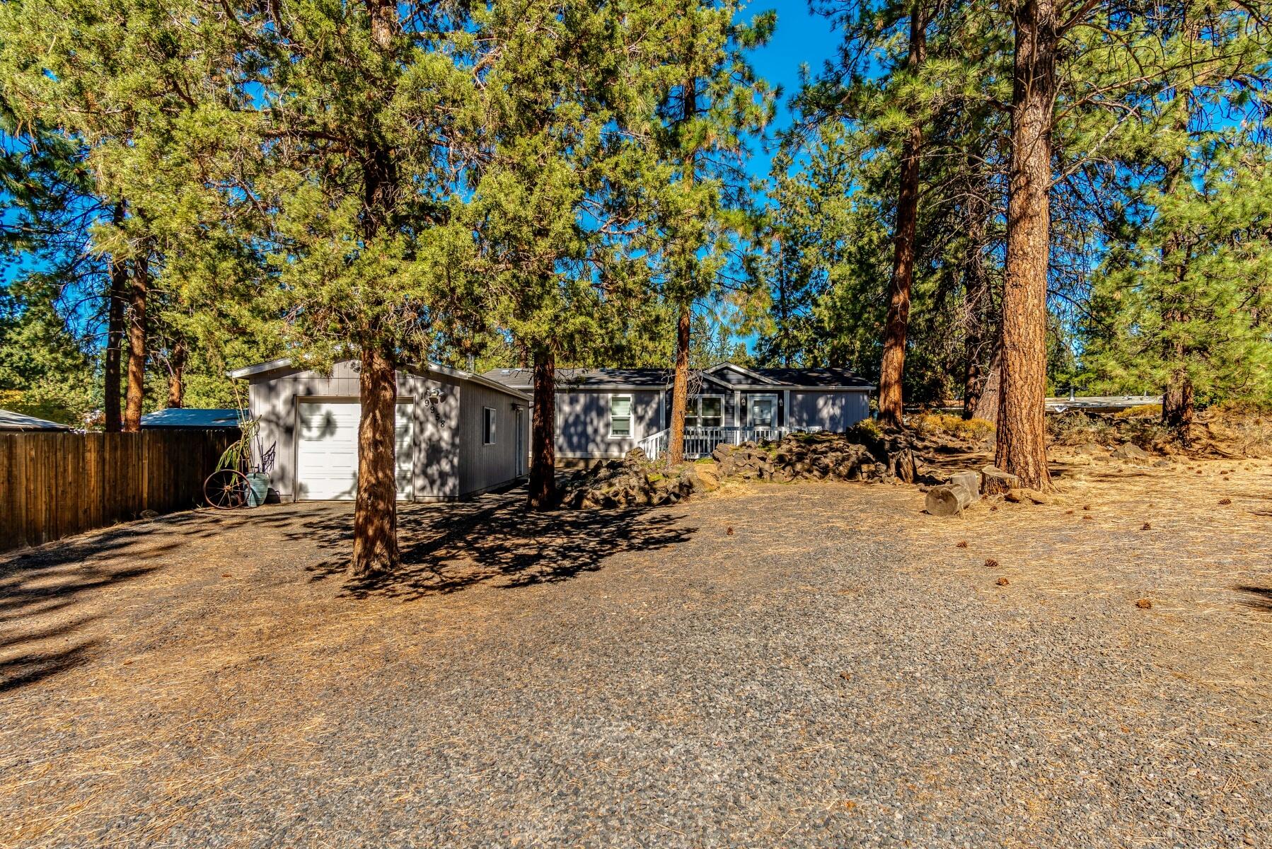 Super cute home nestled in the pine trees of Romaine Village. This move-in ready home has been updated with new flooring, appliances and paint. A nice, open floorplan and separation of master with the other bedrooms, really makes this home live larger than its square footage. The detached garage completes this lovely property set up.