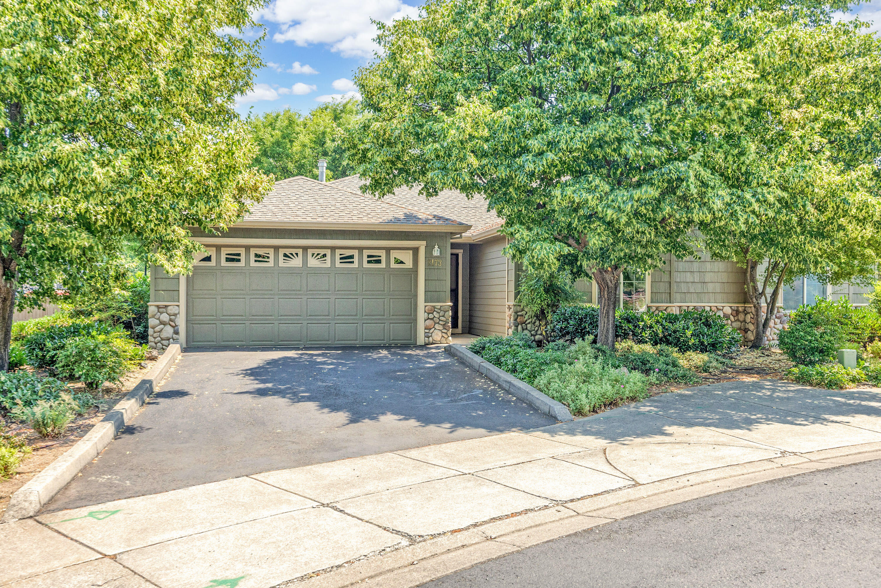 Single level townhome within the desirable Birchwood at Ashland Subdivision. These homes provide a user-friendly open floor plan with two bedrooms and two bathrooms. Approx. 1359 SF of living space with an attached garage on .12 of an acre lot, built in 2000. Recently updated kitchen as well as one of the bathrooms. Laminate flooring throughout the main living areas. Living room has a gas fireplace and a wall of windows for natural light and to enjoy the views of the backyard patio plantings. Dining room has access to the lovely patio area. Well planned out community with beautifully kept plantings, guest parking bay and pathways. Close to shopping, the YMCA, and city services.