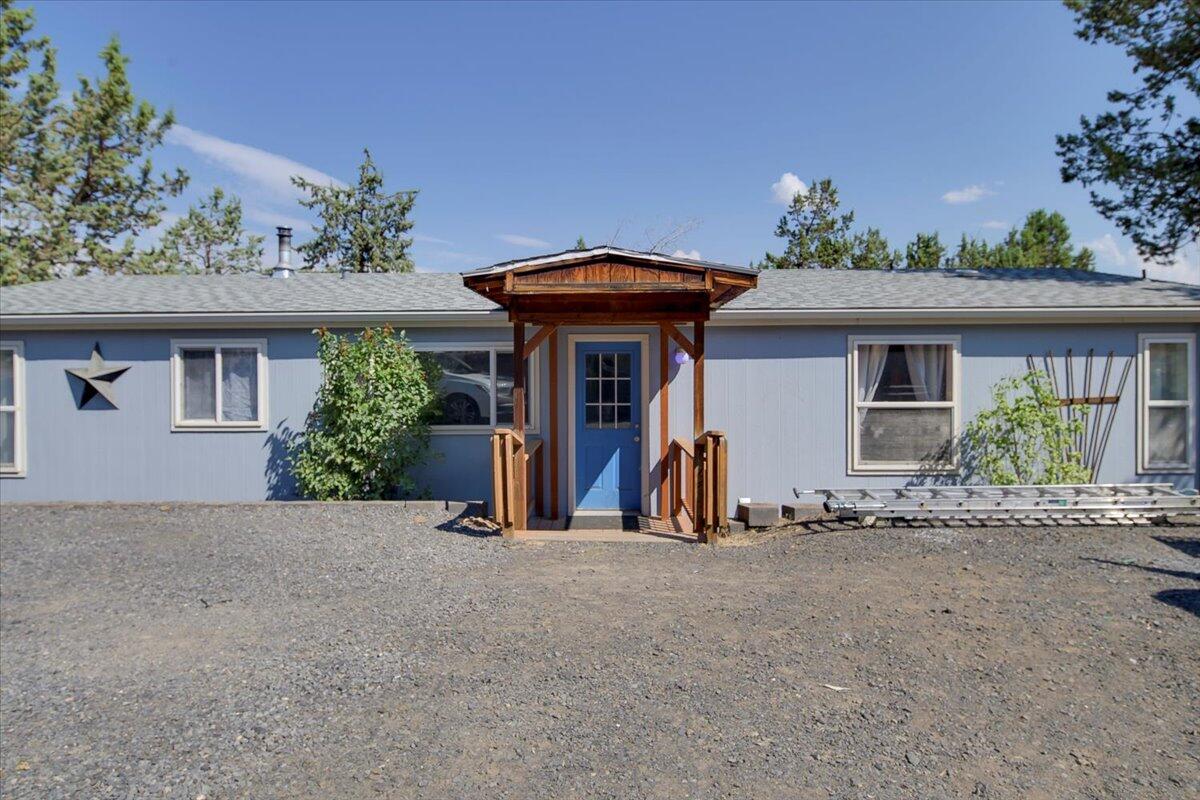2 peaceful acres just minutes from town, this beautifully updated 3-bedroom, 2-bath home offers comfort, charm, and room to breathe. With fresh updates throughout and plenty of outdoor space, it's ready for you to move in and enjoy Central Oregon living.

Inside, you'll find new carpet, new flooring, and fresh paint throughout, creating a bright and modern feel. The updated kitchen features bold blue cabinets, stainless steel appliances, and ample counter space, flowing seamlessly into the dining area with large windows and natural light.

The spacious primary suite includes a spacious sink vanity, and a soaking tub for a the perfect place to unwind. A brand new A/C unit ensures cool comfort through the summer months.

Step outside to enjoy the expansive private deck, surrounded by mature trees and nature. And for the young or young-at-heart, don't miss the standout features a custom-built treehouse tucked high in the pines.