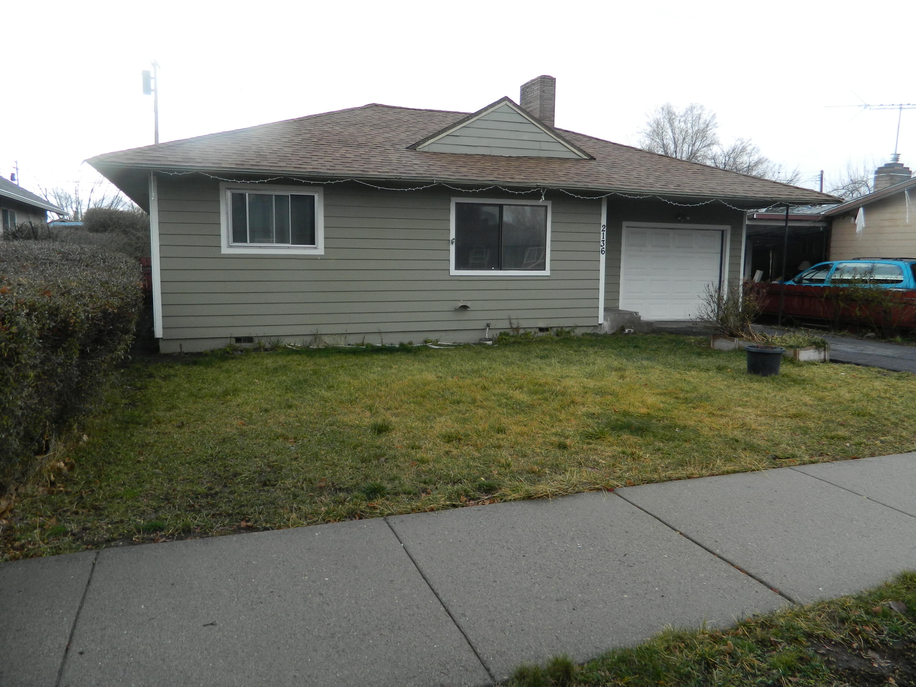 This 3 bedroom 1 bath home with an attached garage that would be a great starter or rental. It has laminate flooring throughout. It has a good open kitchen/dining area. There is alley access to the back yard where there are several fruit trees including plum, apple, pear and peach along with an extra storage building. There is a gas insert in the fireplace