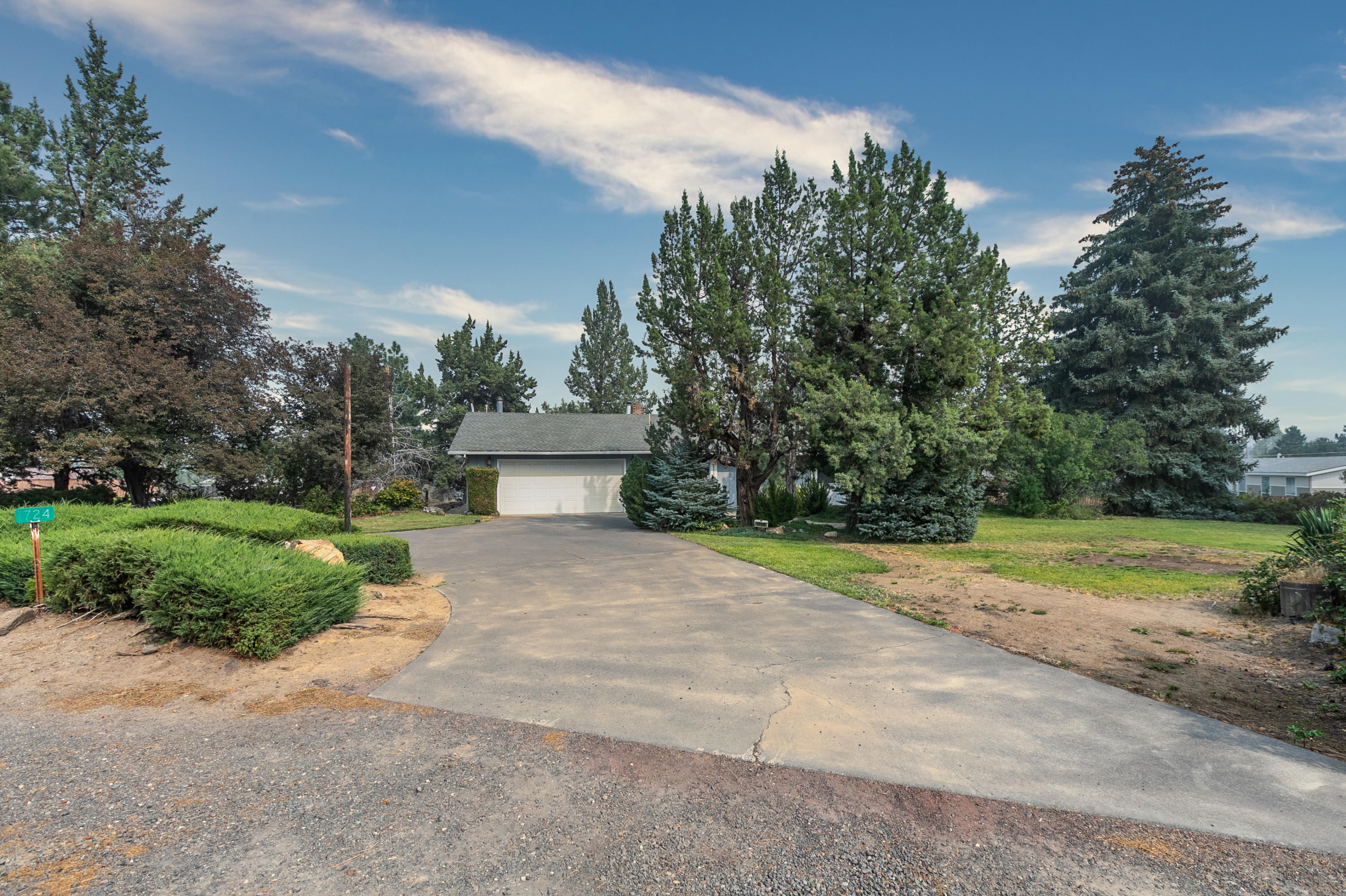 Great Location, close to shopping and schools. With lots of space for entertaining on this nearly half acre lot. Large deck and private paver patio at front of the home.  Plenty of room for RV parking.  Home has a Living room, Family room and a large 300sf Bonus room which isn't included in the total SF. With plenty of storage area throughout the home.  A big utility room with lots of cabinets and the washer dryer are included, plus it has a large utility sink.  Endless possibilities throughout this home and property.