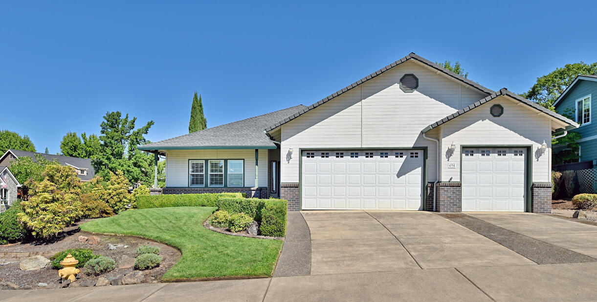 Situated on a large corner lot this well-maintained 3-bedroom, 2-bath home offers an inviting open floor plan with plenty of natural light. The kitchen features quartz countertops, stainless steel appliances, a walk-in pantry, and a dining area that opens to a spacious screened-in porch or sunroom, perfect for year-round entertaining or quiet mornings with a cup of coffee. The large primary suite includes a walk-in closet, dual sinks, a separate vanity, and a tiled walk-in shower. Two additional bedrooms are generously sized, and the guest bathroom is bright with natural light. The backyard offers a beautifully landscaped, low-maintenance retreat with stone walking paths and birdbaths, ideal for relaxing without extra yard work. Living here means enjoying access to an award-winning golf course and Talons Restaurant, where you can enjoy gourmet meals with stunning views.