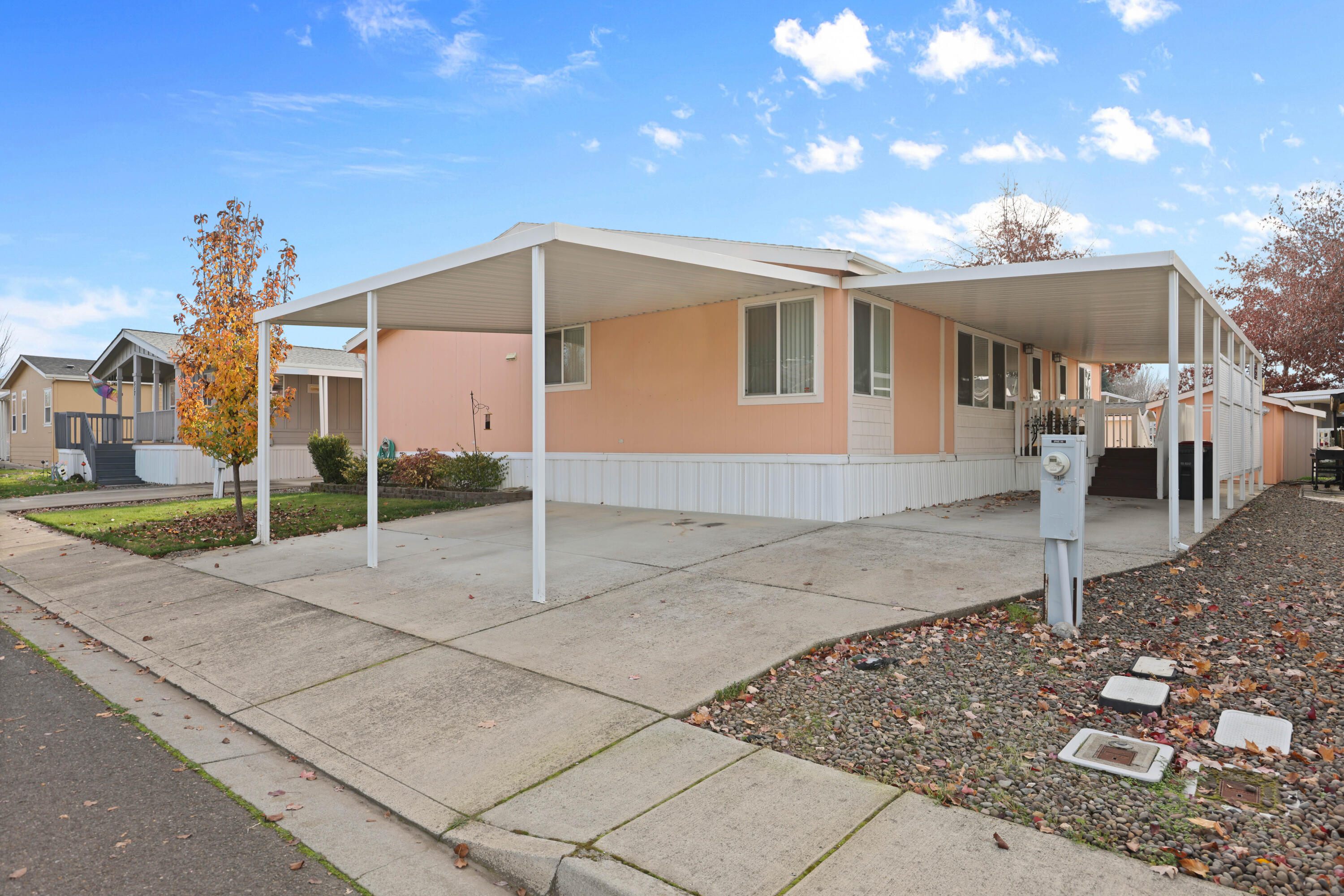 This 2005 Manufactured Home, has 2 primary suites, A highly sought-after feature! Enjoy the luxury and privacy of two separate Primary Suites, each complete with its own bathroom. This home also provides an open and inviting atmosphere perfect for entertaining friends or relaxing with family. Work from home with ease! A separate, dedicated office space offers the quiet and privacy you need for productivity or could easily serve as a hobby room or den. Don't miss the opportunity to own a home that offers both size and versatility. This property is an excellent choice for those seeking a highly functional and spacious layout within a community setting.

Schedule your private showing today and discover all the potential this incredible manufactured home has to offer!