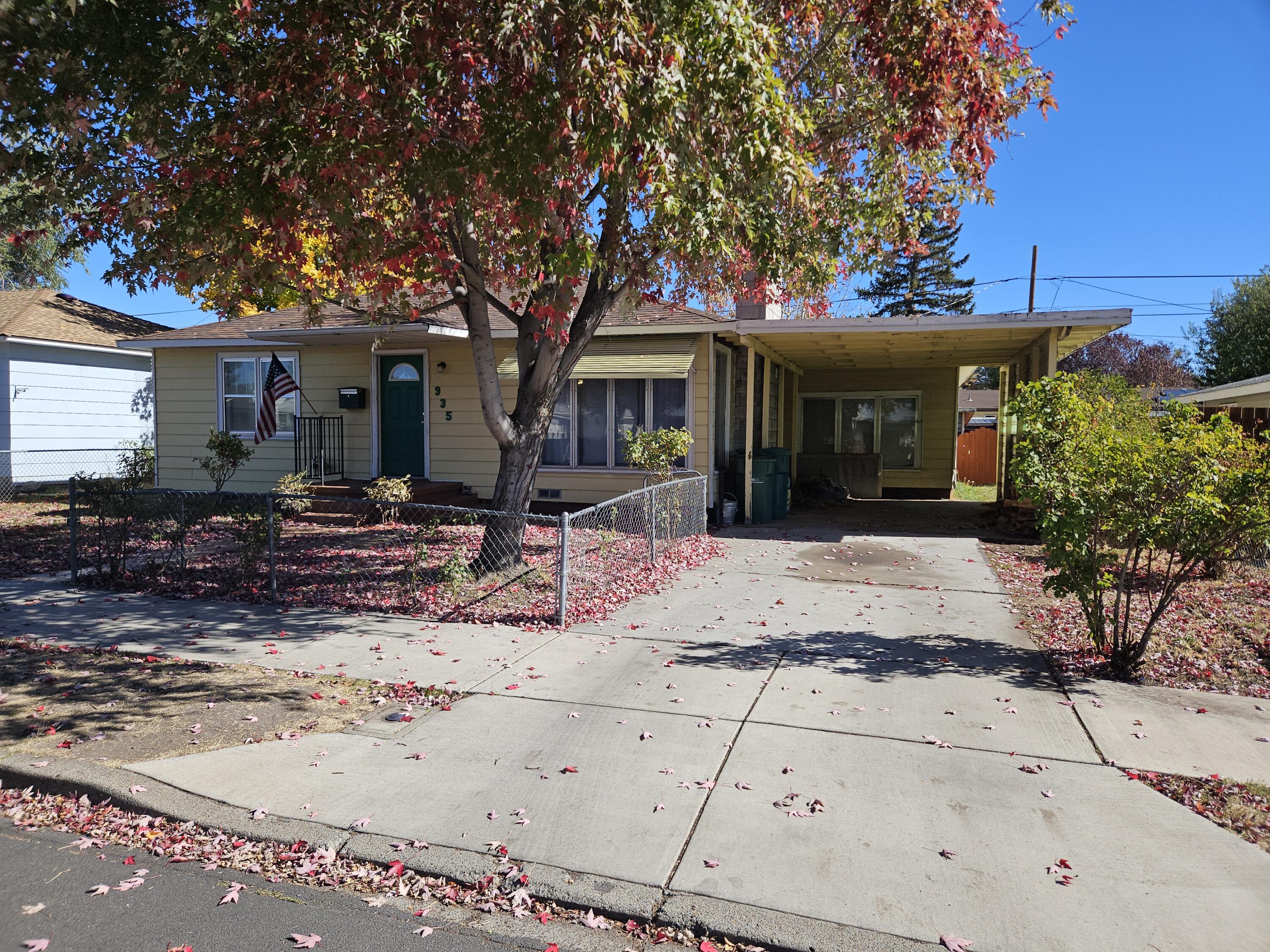 Charming cottage home on a quiet street that is close to shopping, schools, bus lines and parks.  Fenced front and backyard.  Garage was converted years ago into a bonus room now used for a bedroom and has access to the backyard.  Gas heat, laundry area, Dining room that is open to the kitchen and the living room.  Wood fireplace insert keeps things warm and cozy!