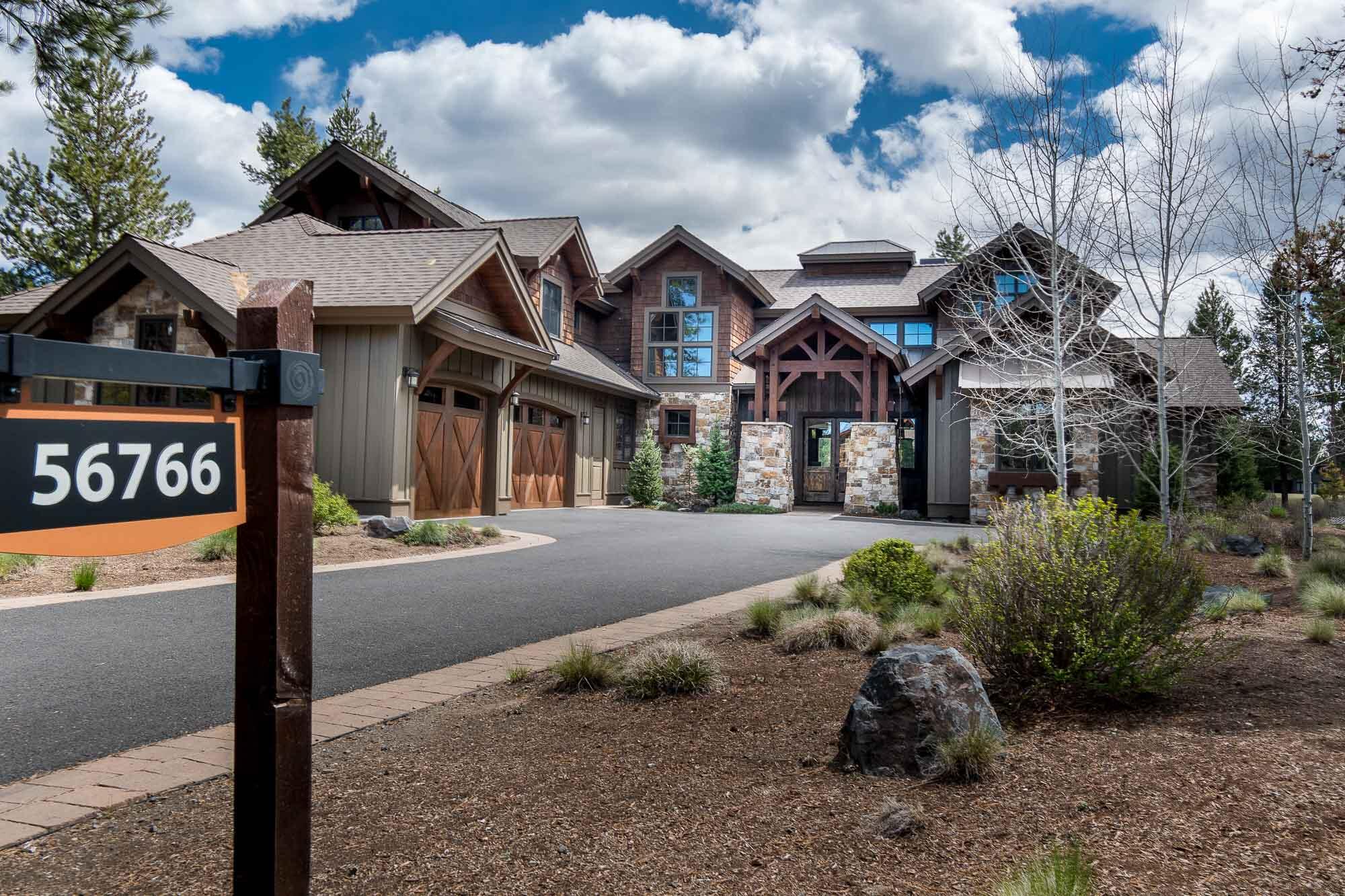 Custom Pineriver Homes built residence w/ golf course views in Caldera Springs! Open floor plan includes a gourmet kitchen w/ chiseled edge granite, coffered wood ceiling, copper sink, copper hood, large hidden pantry and high end appliances. Dining area w/ bar, hardwood floors, vaulted tongue and groove wood ceilings in the great room and floor to ceiling stone/gas fireplace w/ built ins. Spacious mud/laundry room leads to a 3-car garage. 2 suites on the main level, plus an office and additional flex space/workout room. Upstairs you will find 2 additional suites, a bunk room, plus a large bonus room. Wonderful outdoor space overlooking the golf course w/ built in BBQ, paver patio, hot tub and fire pit. Additional features include zoned heating and A/C, wood windows, new exterior paint and much more. This home is quality throughout.  Start making memories in this Caldera Springs home!