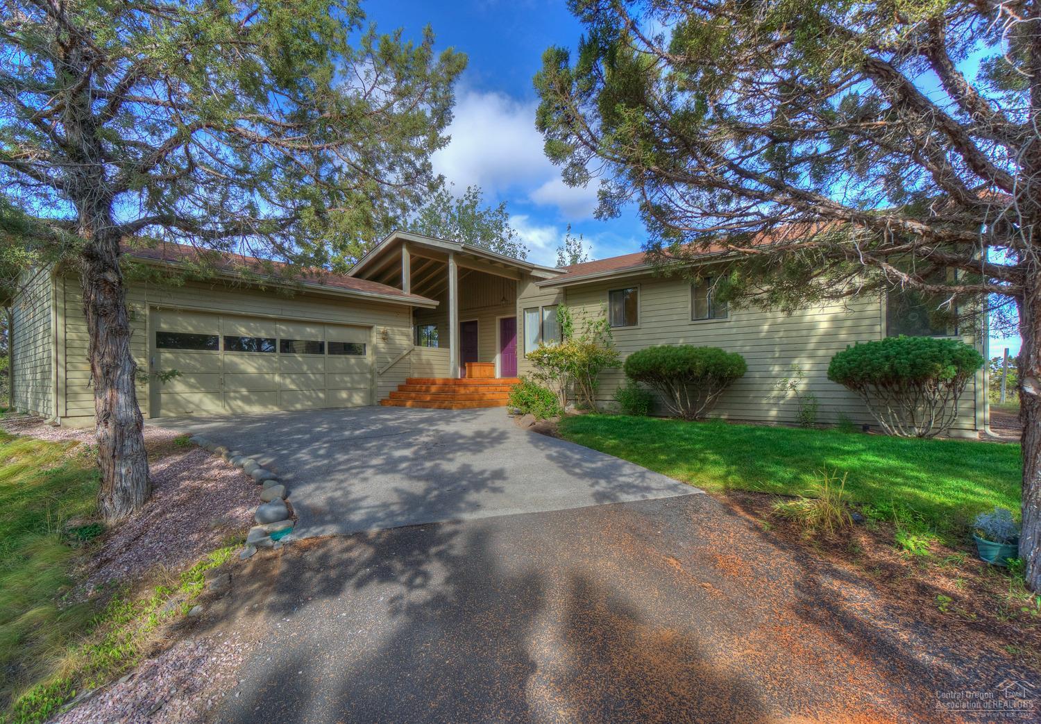 Enjoy striking Mountain Views from this classic custom home w/end of road privacy. Floor to ceiling windows in great room, extensive beam work & lots of detail. Big vaulted ceiling lives large, kitchen has a center cooktop island, wall oven & tons of storage. Master has a tiled shower & soaking tub, large walk in closet. Step outside to the wrap around deck & beyond to your property. Natural landscape is easy to care for. New interior paint, clean & move in ready. Room to build a shop & park all your toys!