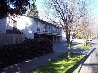 Excellent investment opportunity in downtown Grants Pass. 15 unit apartment complex on 0.49 acre lot and 2 bedroom, 1 bath home on 0.17 acre lot. Stable occupancy with increasing rents opportunity. $15,000 credit to buyer for exterior paint. Assumable loan at 7%. Square footage is approximate. Both tax lots to be sold together.