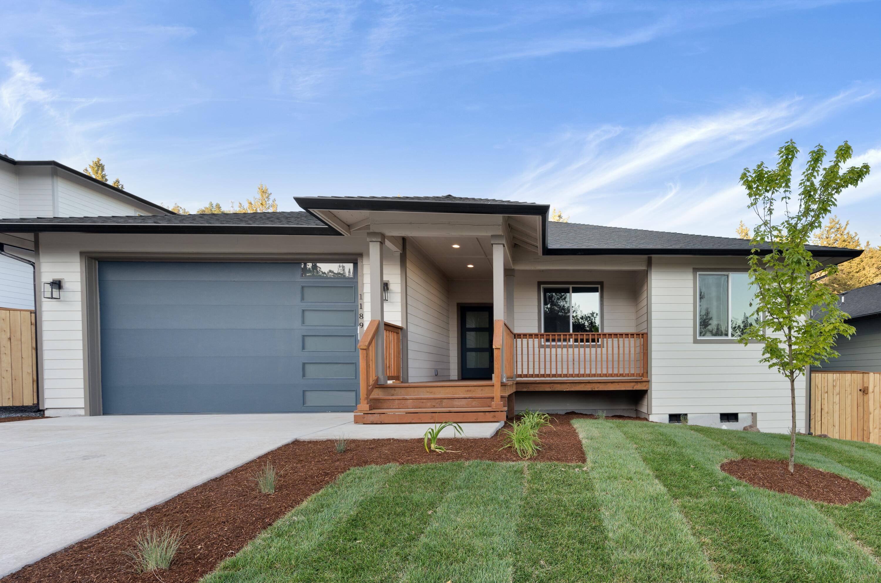 This stunning new single-level 3 bedroom, 2 bath, 1710 square foot home with soaring 9-foot ceilings invites you to entertain and relax, with abundant natural light flowing through large windows. Modern large kitchen with eating bar and big pantry includes quartz countertops, wood shaker cabinetry, soft close doors and stainless steel gas range. Open great-room layout with full-height tiled fireplace with mantle. Perfect for gathering and entertaining with slider that opens to vast, private back yard. Oversized primary bedroom suite has full bath with tiled shower, 2 sinks and huge walk-in closet. High-end quality finishes throughout with wrapped windows, custom trim and luxury vinyl plank floors, AC and high efficiency gas furnace. Gorgeous, peaceful back yard, and on corner lot! Located in a quiet, walkable neighborhood, just a short drive from Downtown, Kingsley Airbase, Sky Lakes Medical Center and OIT. Home is complete with beautiful modern finishes, perfect and ready to move in