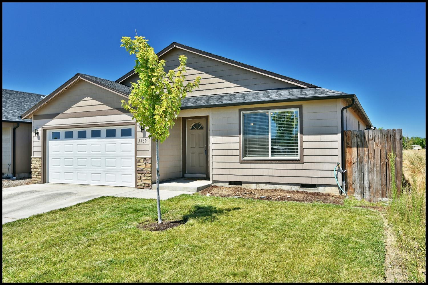 What a great home that is like new! Just 3 years old, this house has a great floor plan. Enter into an inviting living room complete with a ceiling fan and an open concept that leads to the kitchen. In the kitchen you will find richly stained cabinets with complimentary flooring and nice granite counters. Through the kitchen you will find the dining room. All flow from front to back. From the dining room you can access the nicely landscaped backyard complete with an inviting deck, perfect for BBQ's! Down the hall are all 3 bedrooms. All good sized. The laundry is inside as well! Hurry and tour this wonderful property before it's gone!