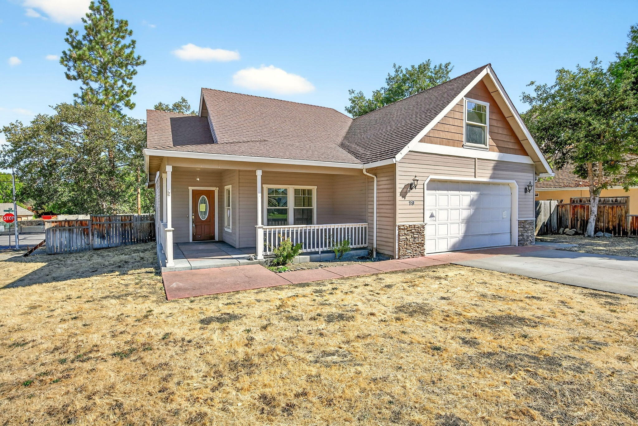 A true diamond in the rough, this home is priced to sell and waiting for all of your updates and finishes.  Located in close proximity to local dining and walking paths, this home sits just across from the Eagle Point Golf Course Community. 
Main level living with open living room, formal dining and primary suite.  Split floor plan with the additional guest bedrooms and bath on main level and upper level rec room or 4th bedroom with attic access storage and vaulted ceilings. Corner lot with covered porches front and back, 2-car attached garage and potential for RV parking.  This home is being sold in its AS/IS condition.