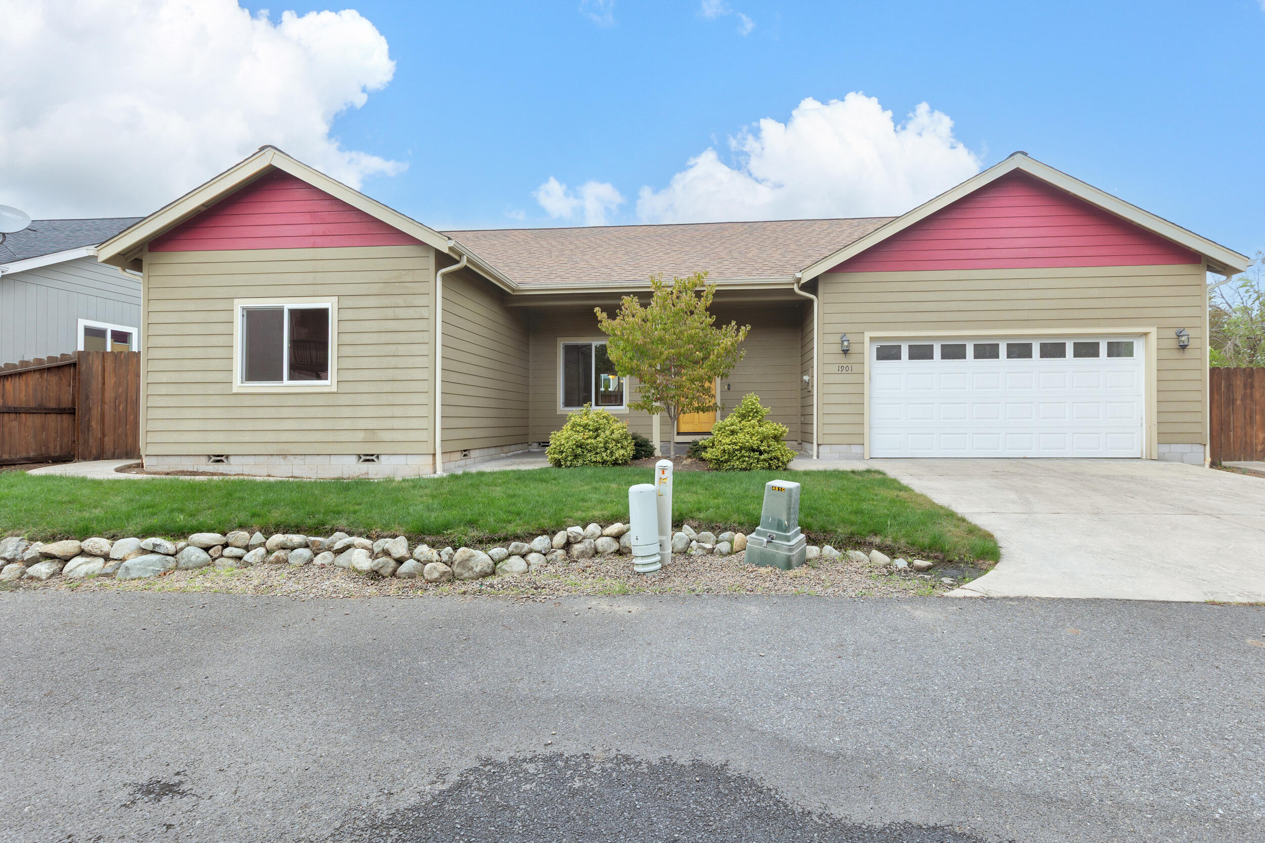 Lovely 3 bedroom 2 bathroom home built by Valerian Homes in 2016! This home is off of a private lane and does NOT face G St.  Open concept living with spacious vaulted living room, beautiful wood laminate flooring, granite kitchen countertops with a breakfast bar on the island, a fabulous pantry, generous laundry room with large sink, and finished attached 2 car garage! Split floor plan with primary suite that includes ample walk-in closet, double bathroom vanity with granite countertops, and custom tile shower.  Exterior features include covered front porch/entry and covered patio (plumbed for your gas BBQ) off the dining area, both with stamped concrete.  Low maintenance yard with in-ground sprinklers.  New Interior paint maintains that ''New Home Feel''!  Great location is close to downtown, shopping, parks, medical services, and more.  Move-in ready! Back on Market- No Fault of the Property!