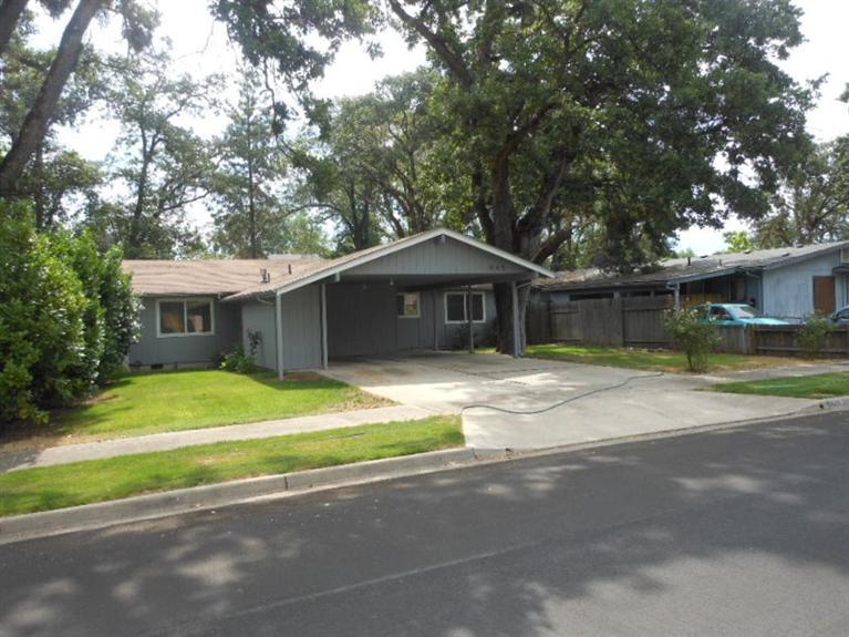 Centrally located, near down town location. Easy Access to Shopping, Freeway, downtown.This home has been freshly painted inside & out. New vinyl in both bathrooms, kitchen, dining area, entry, laundry room, and hall to kitchen. new carpet through out with 6 lb. pad.New light fixtures. The home is ready for your personal touches. Metal storage building back yard, The back yard is also fenced.