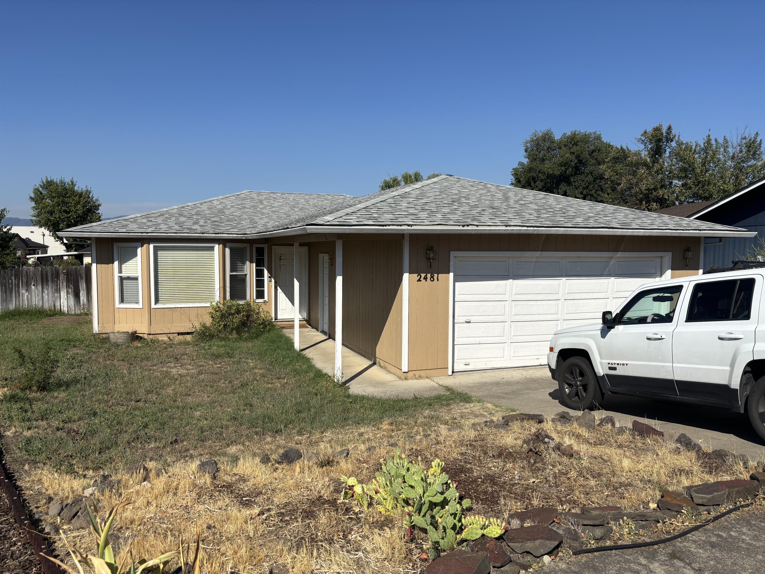 Priced for immediate sale! East Medford home on a cul-de-sac featuring a fantastic floor plan with 3 bedrooms, 2 baths, and a spacious great room with bay window and laminate floors. Forced Air Gas Heat, Central AC, Kitchen with gas range and tile backsplash opens to the dining area. Large 2-car garage and rear concrete patio. Landscaping needs TLC but with its 0.17 acre, this home offers real upside potential!