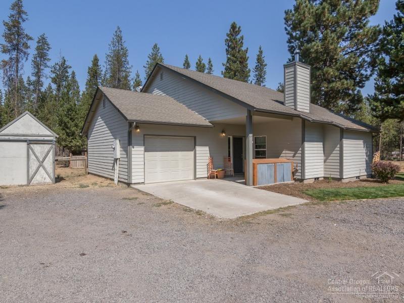 This modern, rustic mini farm is within just minutes to the Deschutes River, the Cascade Lakes and Sunriver's bustling shops and dining. Property offers it all with a spacious .94 acre treed lot with large 24' x 36' Shop, horse barn, chicken coops, fencing, fire pits & plenty of parking. The beautiful custom home features 2 BD with a large loft, which is currently used as the master bedroom, 2 bathrooms, dramatic vaults, lots of natural light, a warm & inviting wood stove, and barn wood beams/accents. Home also offers a remodeled kitchen with concrete counters, stainless steel appliances, laminate wood floors, new lighting & fixtures, and a complete & chic bathroom remodel. A Must See!
