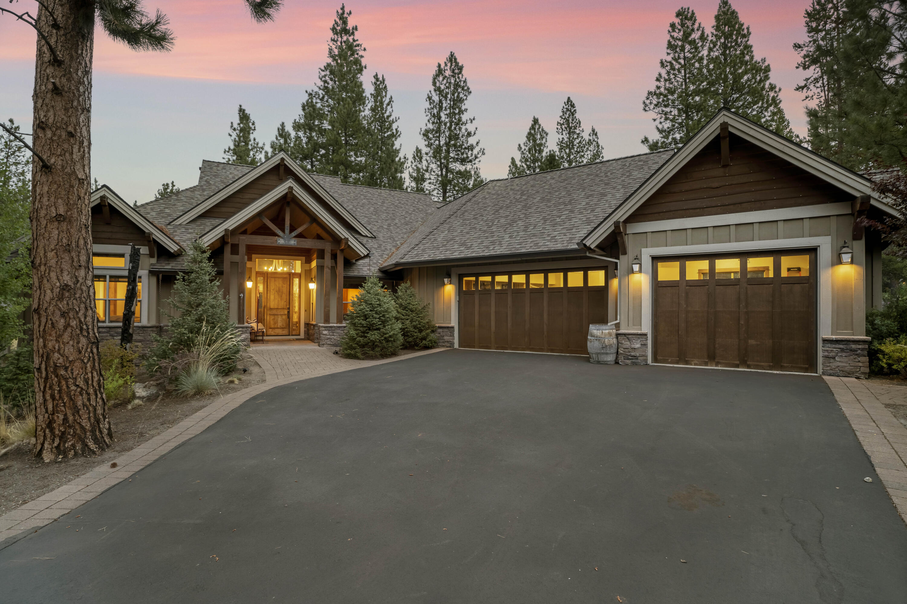 Seller is offering a $20,000 credit at closing.  This Caldera Springs home invites you in the moment you enter. Featuring a spacious primary suite, two secondary suites and a fourth bedroom/flex space on the main level. The upstairs bedroom features oversized built-in bunks with trundles for added guest accommodations. Ample storage and second full bath upstairs. Outdoor living experience in this home is unmatched - enjoy views of the water and Sable Rock Park from the backyard. Trex-decking and pavers span across the back of the home featuring a firepit and sunken hot tub for added privacy. The home sits on a 0.35 acre homesite and expands towards spacious common area to the east - take in endless views of the surrounding lush trees and natural rock. Owners enjoy an exclusive suite of amenity offerings in Caldera Springs including the Quarry Pool, Forest House, Forest Park & more. Schedule a private tour today!