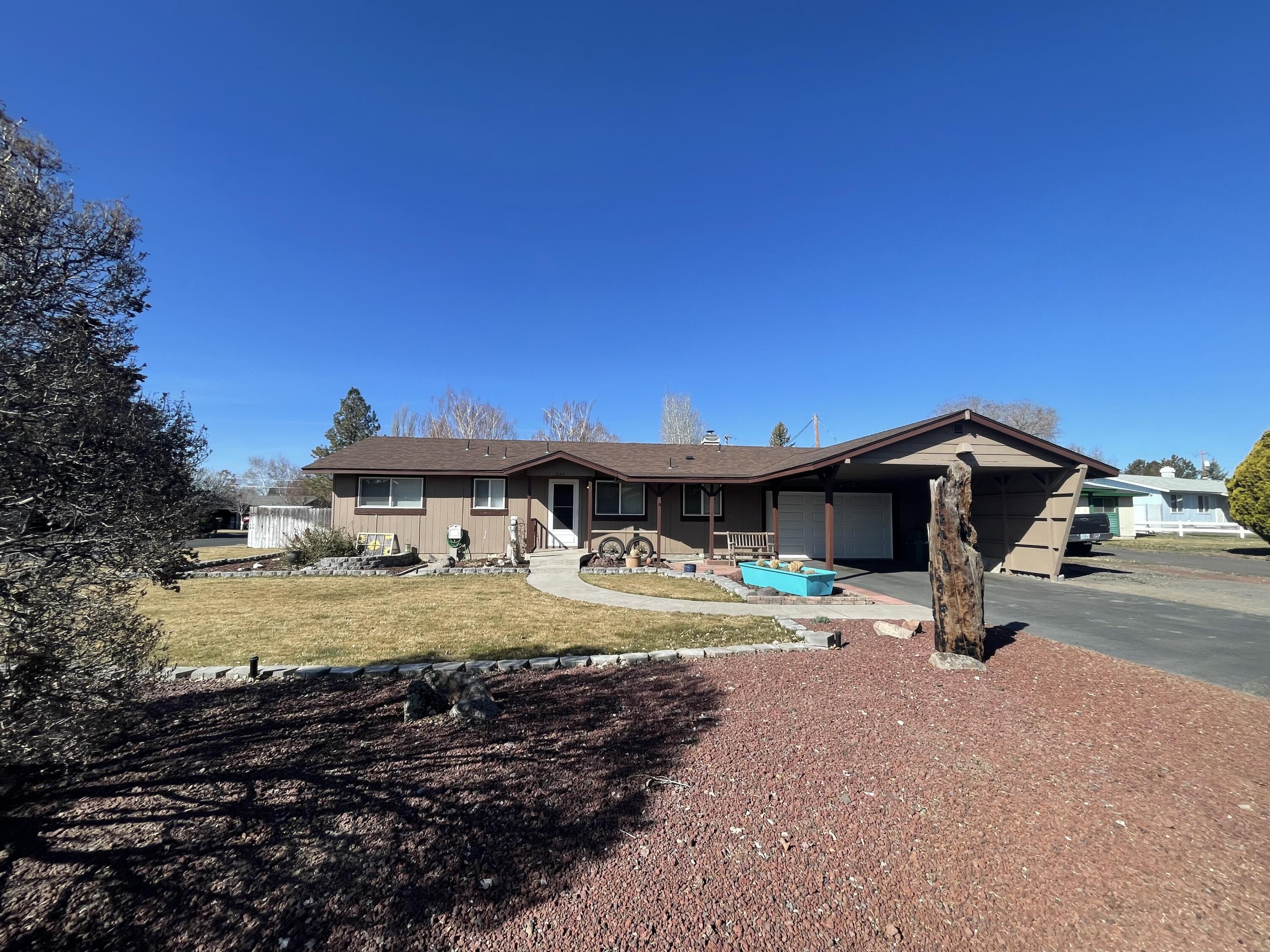 Nice updated home with 3 bedrooms, 2 baths and air conditioning. New flooring throughout the home. Updated kitchen with granite and remodeled master bath. Newer roof (6 years), new furnace (2 years), certified wood stove insert installed last winter, new windows, recently painted inside and out. Large corner lot with nicely landscaped front yard with inground sprinkler system in front and back.  Heated garage and laundry room, shed in backyard. Both bathrooms have taller toilets and main bathroom has grab bars. Irrigation fee to KlD varies, has not been over $90.00

Listing agent is related to seller

All offers received prior to 3/9/22 by 230pm will be presented that afternoon at 3pm