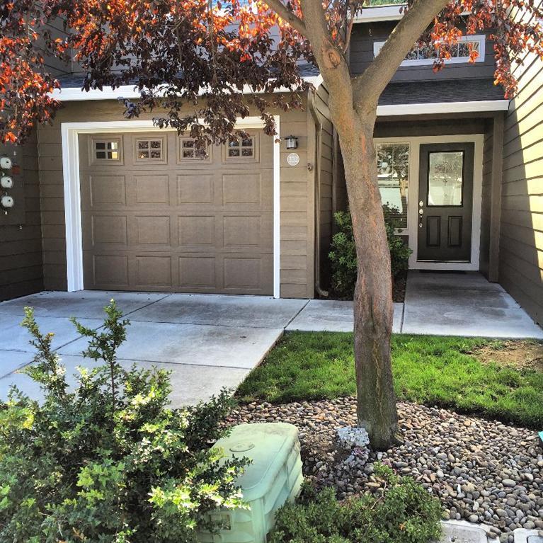 Charming Craftsman style townhome in quiet Central Point Community with its own private park! Conveniently located to Ashland, Medford, Rogue River, the Interstate and airport, this home features cathedral ceilings, nice touches like attractive hardwood banisters and curved arch and angles. Large Pantry. Half bath downstairs, private suite and laundry upstairs, shelving in garage and private patio with your own shade tree. Care free living!Stacked washer and dryer included. Home warranty provided.