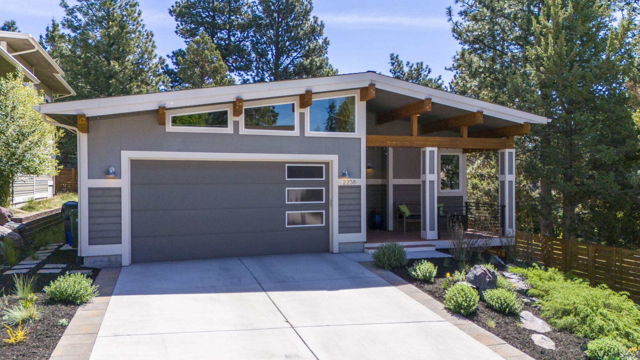 Discover the perfect blend of comfort and convenience in one of Bend's best neighborhoods. This stunning Earth Advantage home is a must see! Nestled on a serene cul-de-sac...offering a peaceful retreat while being just moments away from Downtown Bend, the Deschutes River and incredible parks!  
This tastefully designed, single-level home features an open floor plan with vaulted ceilings, beautiful exposed beams and alluring oak floors. Thoughtful solar orientation and attractive transom windows allow natural light to radiate throughout the home. The gorgeous kitchen boasts Alderwood cabinets, quartz countertops, and a welcoming island.
Outside you'll find a private backyard oasis...complete with a custom deck, hot tub and privacy screen. Perfect for both entertaining and relaxation.  A beautiful, low maintenance yard ensures more time to enjoy Bends recreational lifestyle.
Lovingly maintained by the original owners, this immaculate home displays pride of ownership!
