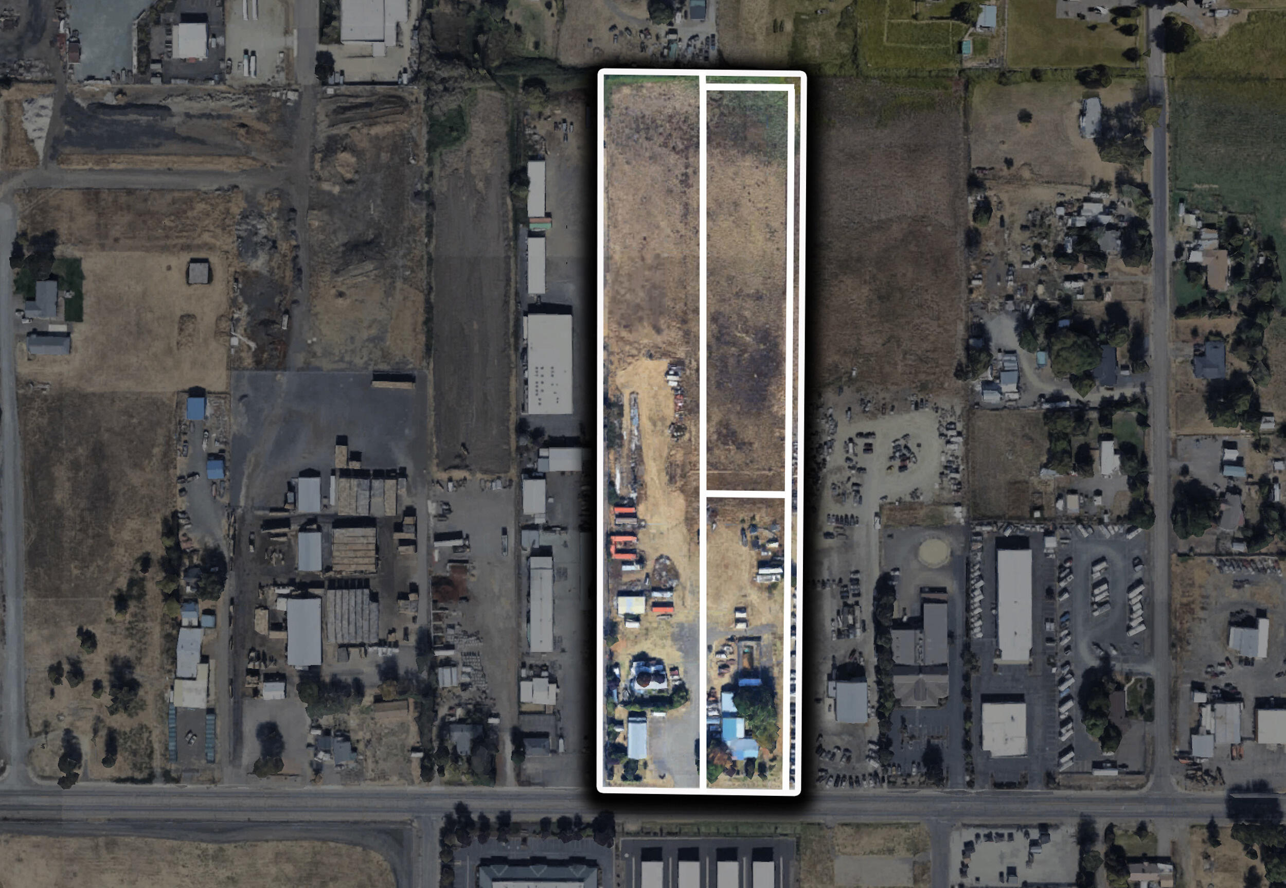 Exceptional 9.88-acre light industrial assemblage along E. Vilas Rd, featuring full utilities, high-visibility frontage, and prime positioning within the rapidly expanding industrial corridor near the Medford Airport and I-5. Includes 579 E. Vilas Rd (4.53 ac) with a leased ±1,800 SF commercial building offering 3-phase power, 3 additional single-phase meters, and a rented mobile home; 605 E. Vilas Rd (1.95 ac) improved with a 1,852 SF single-family residence, 880 SF ADU, and 2 additional single-phase meters; 61 E. Vilas Rd (2.41 acres),  plus a separate 0.99-acre parcel completing the assemblage. Zoned L-I (Light Industrial) and within the UGB, free of floodplain or overlay restrictions. Annexation and zoning modifications may be possible, expanding future development potential. Ideal for storage, warehousing and distribution, contractor yard use, manufacturing and processing, and service business operations.