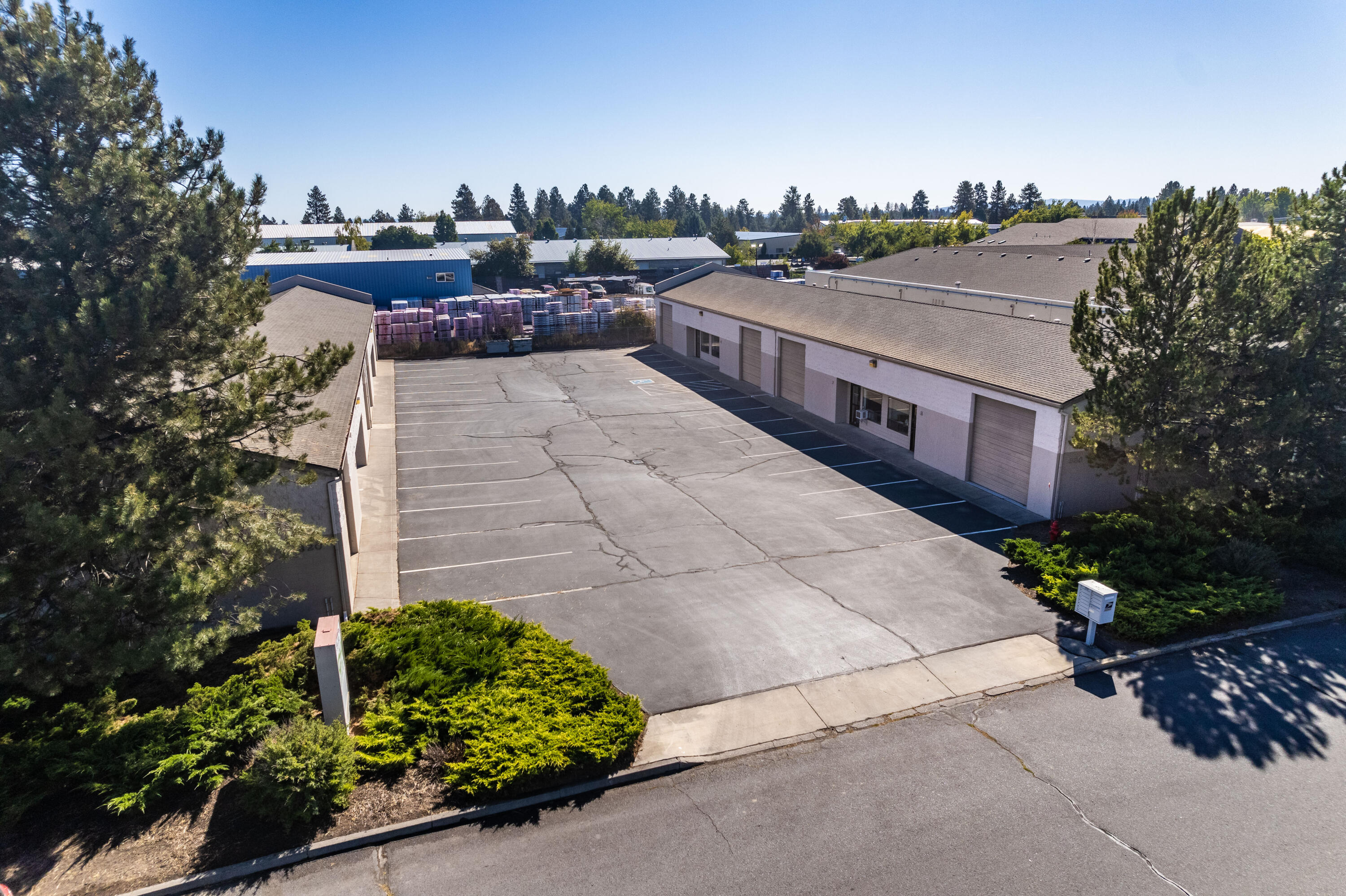 NEW PRICE - PROJECTED CAP RATE AT 6.1% .  Offering memorandum in Documents.  Property consists of 2 buildings with 4 -1,336 SF units (8 units totaling 10,688 SF) on .67 acres.  
Each unit has office space, private bathroom and 12' roll up door.  Each unit has its own electrical and gas meter. Bonus mezzanine space for storage - not included in square footage.  Thirty parking spaces.
Very well maintained as same occupant/owner past 17 years.  Light and bright interiors with polished concrete floors.  Newer composite roof, City of Bend Conforming storm drain completed
And Level 1 Environmental Assessment completed in 2007. Owner to lease back 3 units at $1.15/SF NNN. Call to schedule a tour of this hard-to-find investment.