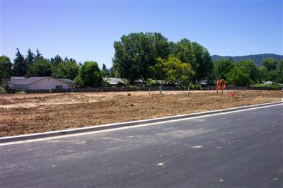 Located near shopping, schools and convenient access to I-5. Lots available to purchase separately or to build to suit. Bring your builder or we can help with house design, financing and builder selection for your buyer. Lots are approximately 50' wide by 118' deep to accept minimum 1300 square foot homes and still have large backyards. Architectural review approval required before start of construction.