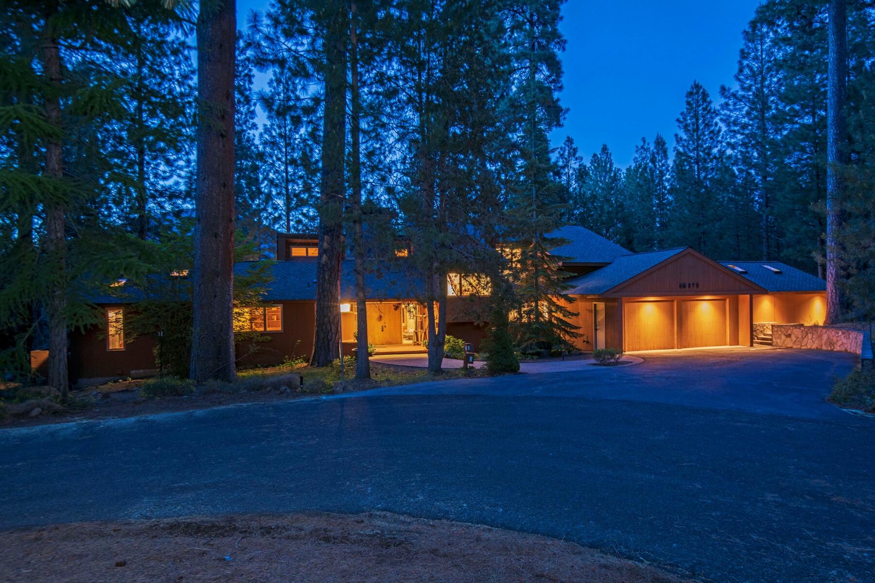 Very private Glaze Meadow Black Butte Ranch (BBR) home, designed by Steve VanSant, is perfect for entertaining on the wrap-around deck w/ a beautiful water feature. Common area on 2 sides of lot. Pavers frame the entrance to the front door. Once opened a gorgeous stone wall greets the Buyer. In the Living Rm, a floor to ceiling stone fireplace and hearth are featured.  The Living Rm is open to a Chef's Kitchen & Family Room. Many windows make the home light & bright. Vaulted wood ceiling & beam in the LR, Family Rm, Primary Bedrm & Shop/Office (off garage). Downstairs a large primary bedroom has a big walk in closet and a bathroom w/a tile shower, tub & 2 sinks. Upstairs are two more en-suite bedroom/baths. Don't miss the special wood paneled Shop/Office off the garage. It could also be an extra bedroom, game room or man cave. Come enjoy all BBR has to offer: 2 golf courses, tennis/pickleball cts, swimming pools, nature trails, biking & 3 restaurants.
