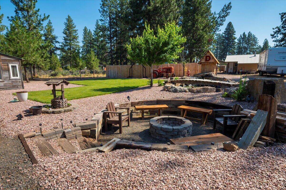 Welcome to your private oasis, just minutes from the city! Nestled on a generous 0.84-acre lot, this beautifully updated home offers the perfect blend of comfort, space, and functionality. The open floor plan creates an inviting atmosphere, while the thoughtfully designed layout features a split-bedroom arrangement-giving the primary suite added privacy from the additional two bedrooms. Outside, you'll find fantastic outbuildings, ideal for storage, hobbies or even a workshop. Whether you're looking for peaceful country living with quick access to town or a property that truly has it all-this one is a must-see!