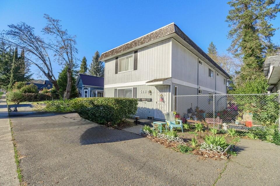 This well-maintained triplex is a fantastic addition to any investor's portfolio, producing close to $3,000 in monthly rental income. The property consists of two 1-bedroom/1-bath units and one 2-bedroom/1-bath unit, offering versatility and strong rental demand.

Numerous upgrades over the years make this property stand out, including updated kitchen and bathroom cabinets (1995), as well as modernized electrical panels and other improvements that add peace of mind and long-term value.

Located in the heart of Grants Pass, this triplex offers the charm of small-town living with easy access to the Rogue River, outdoor recreation, local wineries, and vibrant downtown shops. Enjoy the area's mild climate, thriving arts and dining scene, and convenient location along I-5.

Whether you're looking for steady cash flow or long-term appreciation, this property is a great investment and an exceptional value.