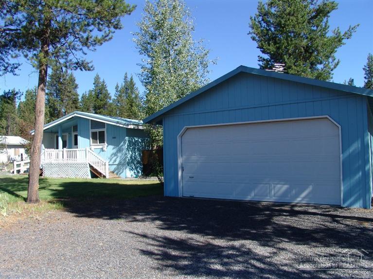 Reduced Price For A Quick Sale!! Health Forces Sale of Home! Really Cute Home on over an Acre of Land + or - Come check out this well maintained Approx 1100 square foot 3 bed 2 bath Manufactured Home Built in 1993! Includes a Stick Built 2 Car Detached Garage, home includes many upgrades! Really a Must See! Close to La Pine State Rec Park, 15 Minutes from Sunriver, and 30 Minutes from Bend! Come Enjoy what Central Oregon Has to Offer!!!Includes Full RV Hook Up With 30 Amp Electric!!!
