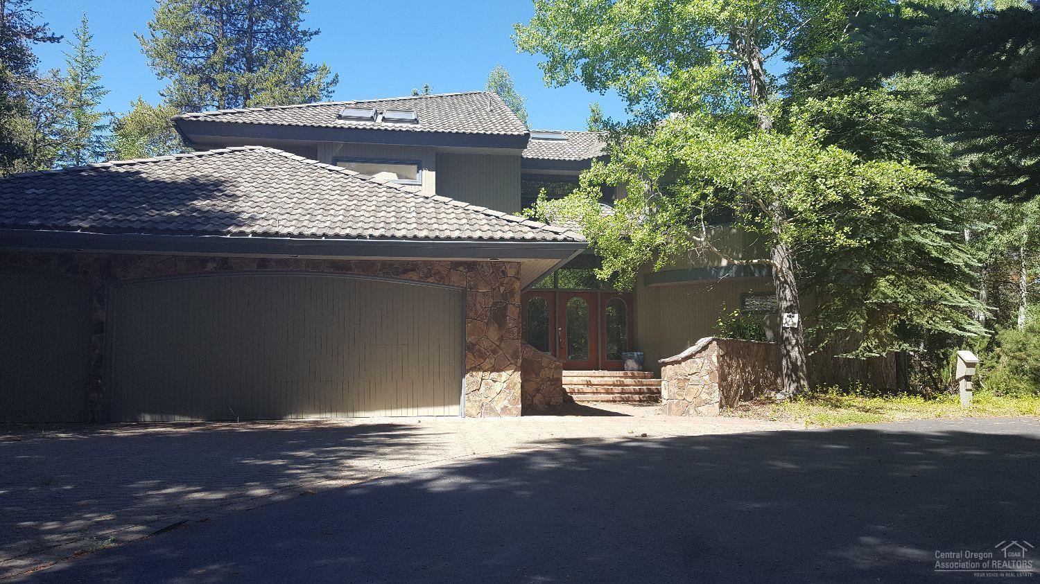 Gorgeous one-of-a-kind home nestled in the woods of Sunriver Resort. Seated at the end of the cul-de-sac this home offers it all! From the grand entry where you will find 2 beds connected by a Jack & Jill bath, large Master en suite, family room and fitness room that offers dry/wet sauna options for relaxation. The upper floor has open concept living & dining room leading into the executive chefs kitchen, breakfast area & wet bar. There is a 2nd, Master suite on this floor w double entry bath & soaker tub.