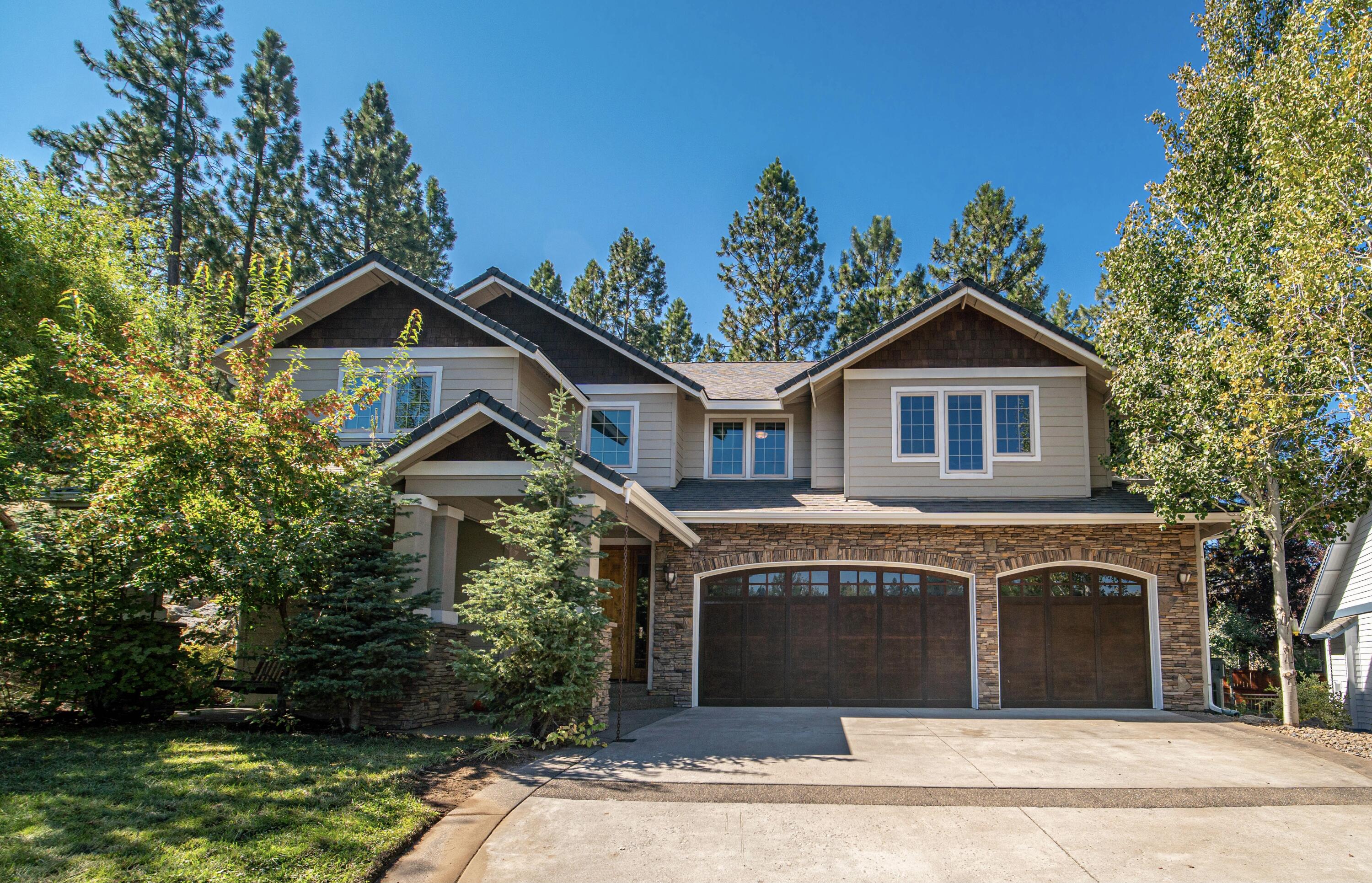 Stunning custom built home with a private backyard on one of the largest lots in Shevlin Crest. Inside this 3,269 sqft home, you'll find an open floor plan featuring a spacious kitchen with granite countertops, stainless steel appliances, a walk through area including a wet bar and large pantry. Second master and office on the main level. The vaulted ceilings offer plenty of natural light throughout the home. Upstairs you'll find a large master bedroom with two walk-in closets, a tile shower, built-in tub and upper balcony. There is nice separation between the master and the two additional bedrooms, laundry room and bonus room. Plenty of storage found throughout this home including the massive three car garage! The private backyard offers a covered patio, built-in bbq and fireplace nestled on nearly a half acre. Walking distance to Discovery Park, Trails, Northwest Crossing shopping, restaurants and medical.