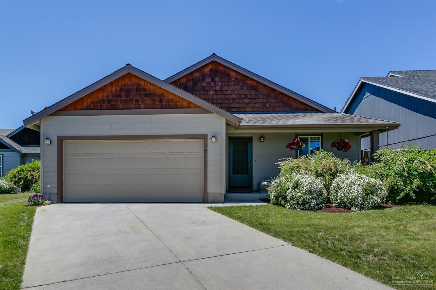 This charming, single level home is located on a quiet cul-de-sac in NW Redmond and features new wood flooring, new trim, updated fireplace surround and a barn door off the laundry. The interior space features 3 bedrooms, 2 bathrooms and is centered around a great room, adjacent to a spacious covered back patio. Fully fenced and landscaped yard is extremely private. Tasteful updates and an ideal location get ready to fall in love!