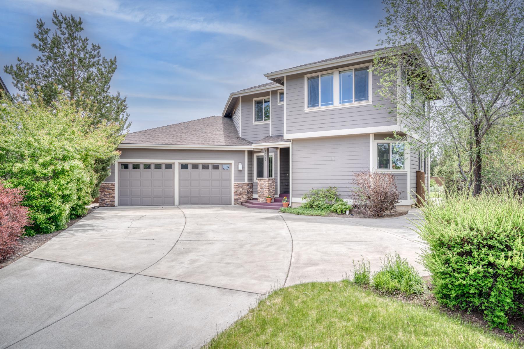 The Jewel of Ridgewater. Impressive custom home built as builder's own home. Exclusive elevated 12,220 ft2 lot on quiet street. Large foyer & home office greet you as you enter. Soaring ceilings & abundant windows allow natural light. Great room w/gas fireplace. Kitchen boasts beautiful Cherry Wood cabinetry, large island, SS appliances, lighted pantry and pristine hardwood floors. Primary bedroom & bath on main level. Luxurious master bath adorned w/ tile shower, Jacuzzi tub, Cherry cabinets & double vanity. Main level also has 370 ft2 theater w/laser projector, 142'' screen & 900 watt audio. Laundry rooms on both floors. 2nd level has 2 guest rooms, guest bath, & awesome bonus room w/ quality cabinetry, wet bar, & enough room to be 4th bedroom. Tandem garage w/41 ft. deep space accommodates boat/RV. Huge driveway parks 8 vehicles. One owner property was lightly lived in & not used as primary residence. Shows like brand new. Designed for entertaining. So much to offer not to be missed.