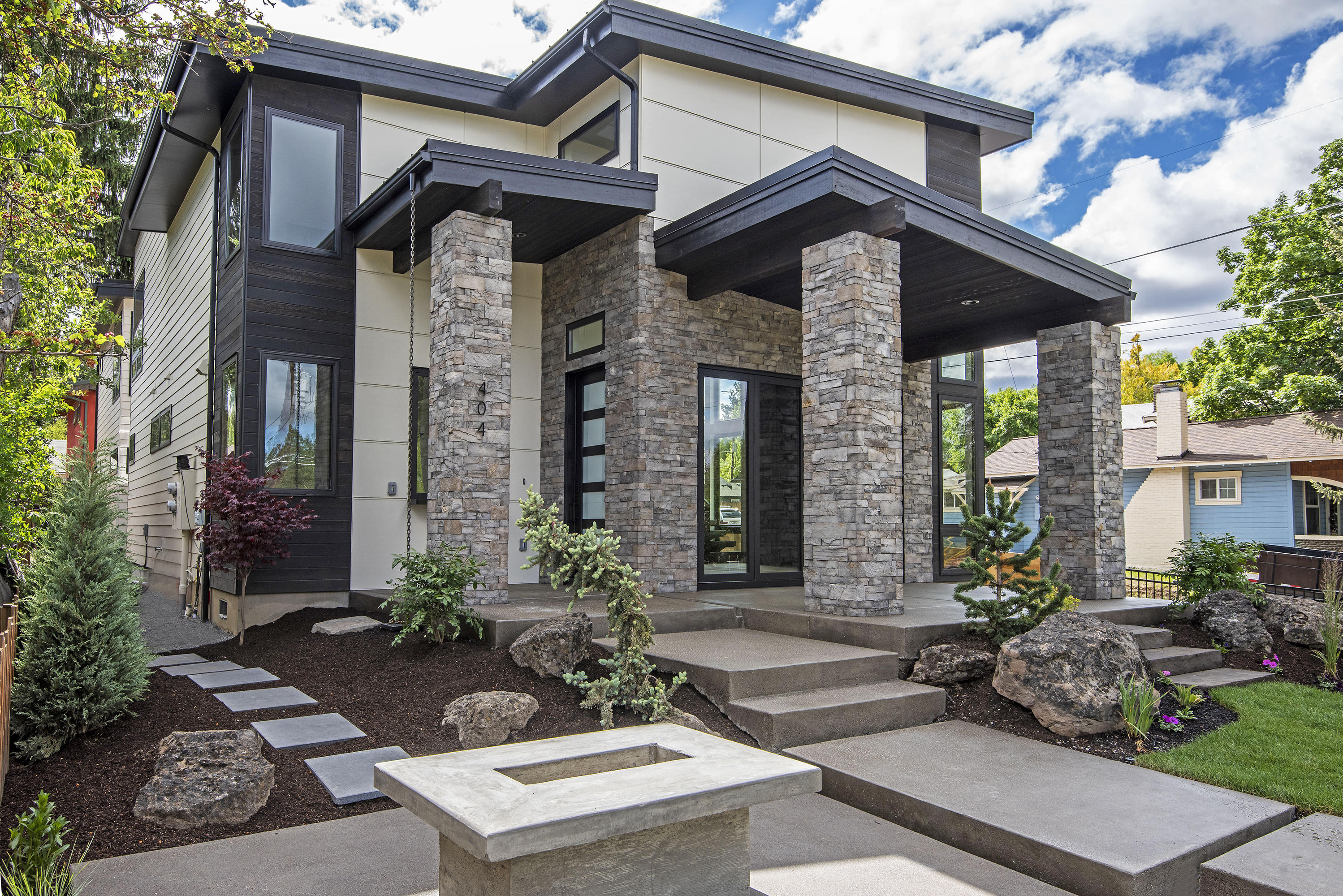 Sporty & Sophisticated in the heart of downtown Bend. You'll be pampered living in this luxurious home styled by it's amazing developer. Many custom features include high-end Anderson windows, cabinetry, engineered staircase, radiant heat in master bath, Moen smart-water feature in shower & more. French Oak hardwood flooring thru-out with Panoramic windows & doors bringing the outside in. Over-sized two car garage with built-ins, hot/cold faucet & sink. 552 sq ft ADU above. Corner lot just steps away from Drake Park & the river. This is the sweet spot in downtown Bend. CLA for more details.