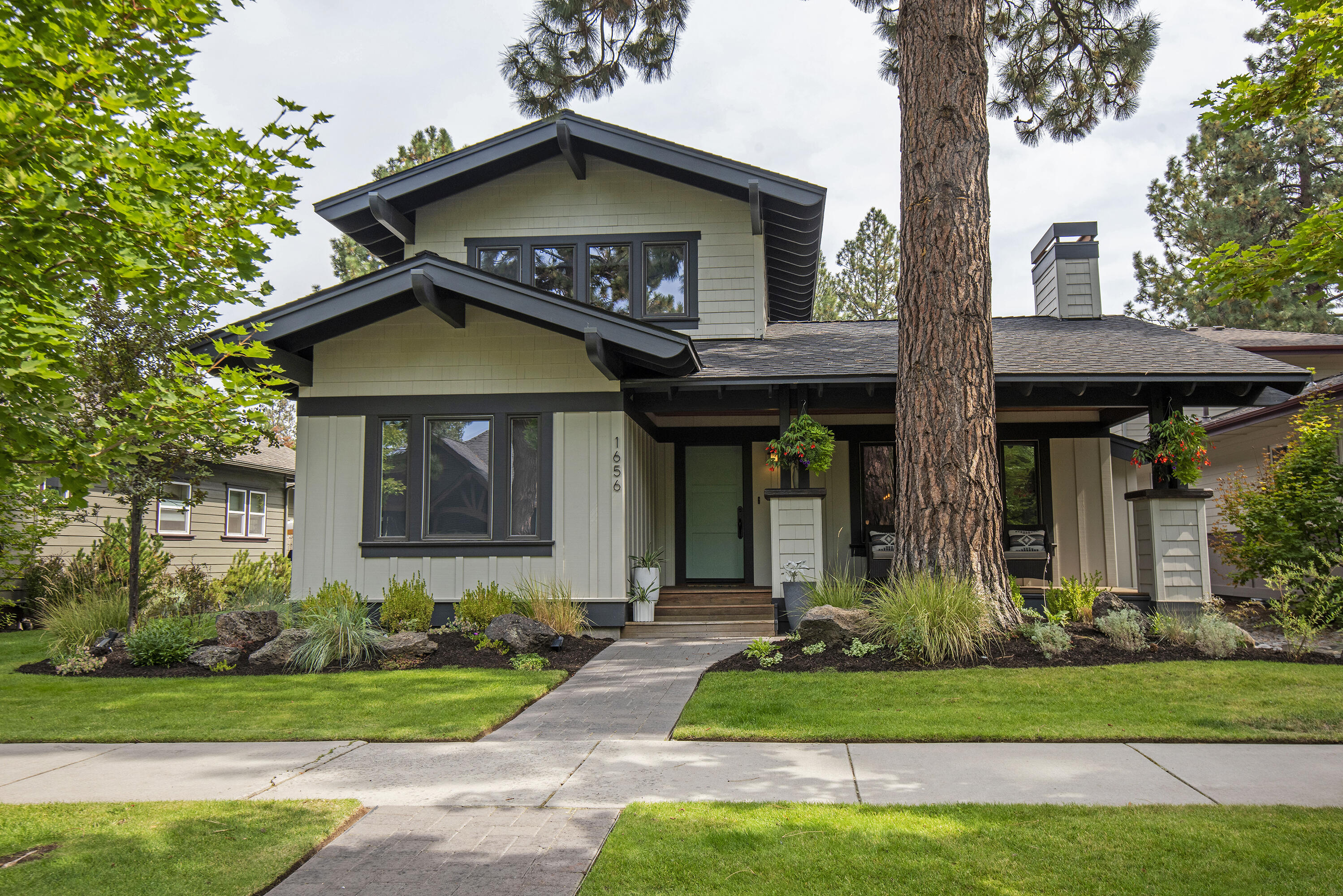 Upgraded, well maintained light and bright open floor plan home located on one of the quietest streets in NWX. Large kitchen features Caesarstone and concrete counters, SS appliances, lots of custom cabinets and a sizable island creates a great environment for cooking and entertaining. The primary bedroom is downstairs and connects to a substantial bathroom with a tiled shower, soaking tub and walk in closet. A second bedroom downstairs is adjacent to a full bathroom. Upstairs includes a bonus room, bathroom and expansive bedroom providing a separate living space. A very private hardscaped backyard with Trex deck, large aggregate pavers, tiled outdoor fireplace with bench seating and a wood pergola for ideal outdoor living. Established low maintenance landscaping. The Northwest Crossing neighborhood has so much to offer and is close to restaurants, shops, parks, schools, farmers market, hiking and mountain biking trails and downtown. Come tour this spectacular home today!