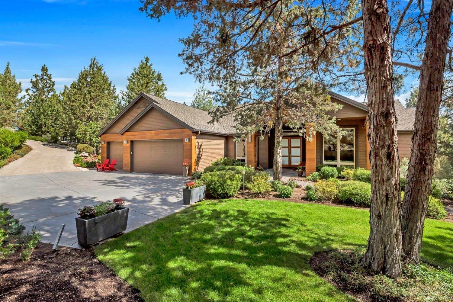Privacy and views! Beautiful, timeless modern design, in the established NW Bend community of Awbrey Butte. Impeccable renovation from top to bottom, with warm, wide plank white oak flooring, solid wood doors and updated energy efficient LED light fixtures and ceiling fans. Master retreat on the main floor with luxurious 6' soaking tub with quartz surround and oversized walk-in shower with quartz bench. Luxurious modern kitchen with custom cabinetry, stainless appliances and solid surface counters.