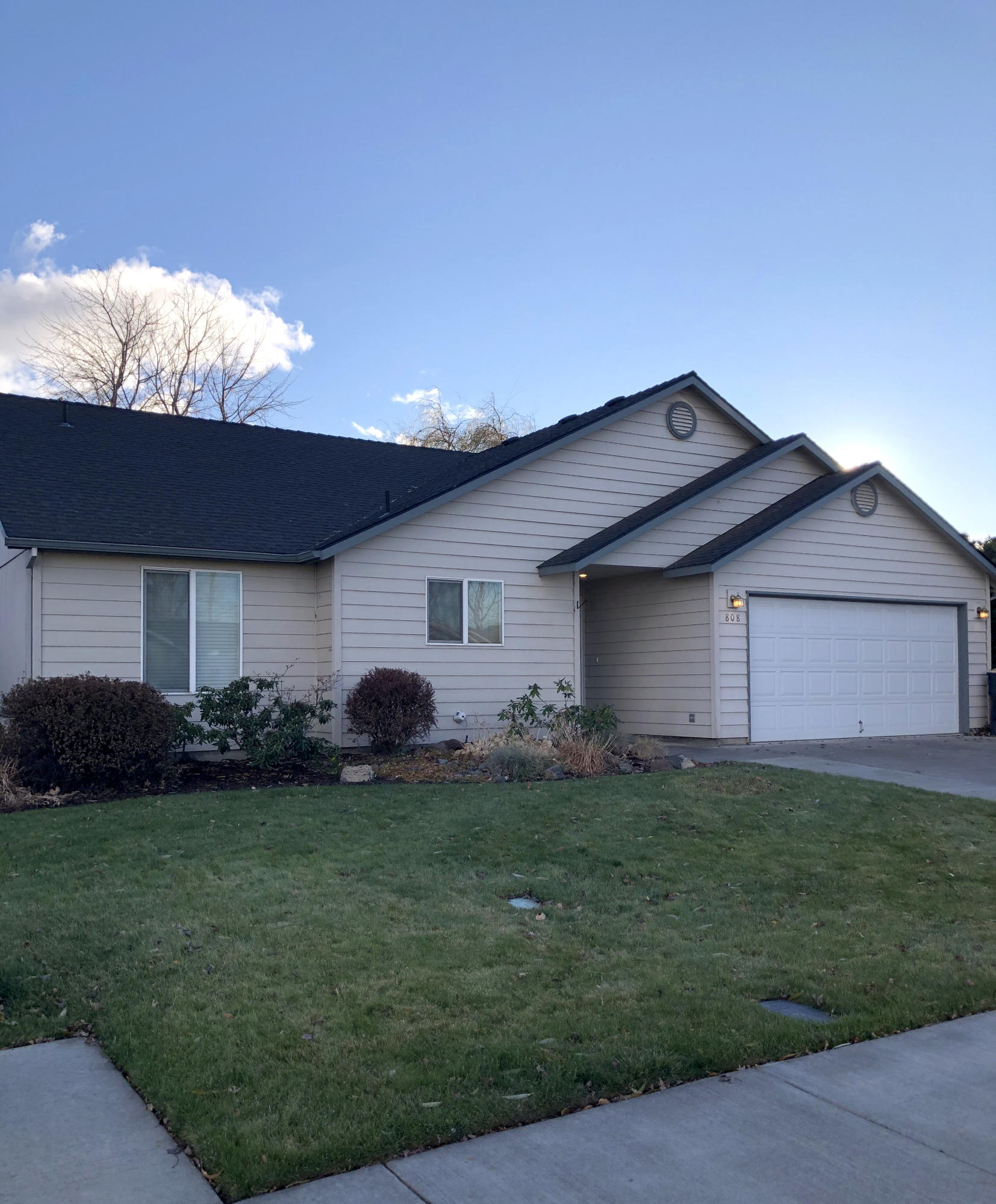 This beautiful 3 bedroom, 2 bath, single level home sits quietly in the well-established Red Bar Estates neighborhood. Close to shopping, medical facilities, parks, restaurants and more. Main bedroom has vaulted ceilings, walk in closet and walk in shower and is very spacious. The living room hosts an oversized gas fireplace that acts as a focal point for entertainment. Sitting on a fenced .17 acre lot  this property feels like a little oasis with the sound of the water feature, birds chirping, your own greenhouse, grapes on an arbor with a bench below and beautiful storage shed, you won't want to leave your own back yard as you feel like you are the only one there with all the privacy it has to offer. This is a must see!