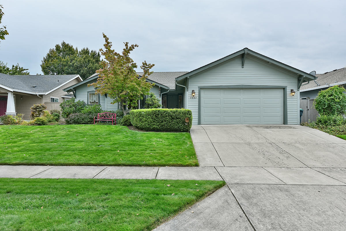 Here's a hard to find 3BR/2BA traditional ranch bungalow located in the desirable Larson Creek area of East Medford that has been meticulously cared for and offers tons of curb appeal with lush landscaping. This charming single level home features an open floor plan with vaulted ceilings, gas fireplace and wonderful natural lighting over 1,682 square feet of living space. The kitchen includes lots of counter space and storage, a built in work desk and large pantry. The large master bedroom features an en suite bath with dual vanities, walk in shower and a walk in closet. A skylight brightens the spacious guest bathroom that has a tub & shower combo insert and the laundry room has built in storage. Enjoy entertaining in the private, park-like yard which has a large extended covered patio, mature landscaping, a fish pond, raised garden beds and is all on an irrigated drip system. This home offers proximity to local golf, shopping, restaurants, medical services and easy freeway access.