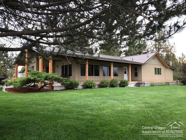 This is a must see property! Expansive Mountain Views from Mt Bachelor to Mt Jefferson. This property is surrounded by upscale homes and located next door to Brasada Ranch; almost 15 acres with Automatic underground sprinklers for 6.4 acres,a large pond with excellent bass fishing, extensive landscaping, covered deck & spacious patio for outside entertaining, 2 Huge Shops(room for 12 vehicles+) including an in-ground car lift, RV shop w/12' doors, too many recent upgrades to list; a few include granite counters, new carpet, newer furnace/heat pump, new triple pane windows, tile floors in Kitchen & baths with heated bathroom floor in the master bedroom, home shows like new! Round pen for the horses, loafing shed/shelter, miles of BLM across the street, and only 1 mile from the Equestrian Center at Brasada Ranch. If it's the details that matter most to you, this may be just what you have been searching for!
