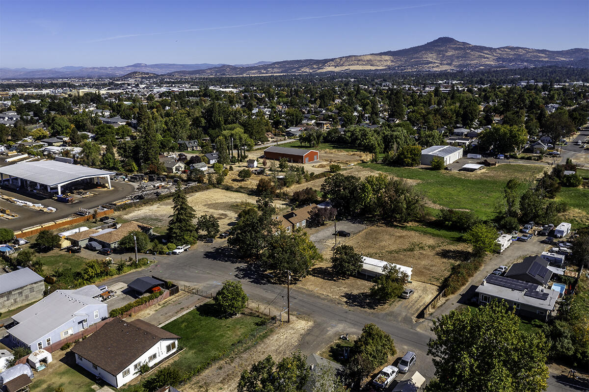 Great offering - Investor Opportunity! Expansive 1.06-acre parcel with country rural feeling, right in the city! 8 single level units comprised of one triplex, two duplexes and a single wide manufactured home. Good numbers and good tenants. Well managed by owner over the past
26 years and many upgrades completed.
New exterior paint for all of the multiplex units over the past 30 days. These units are clean with NO carpeting, all flooring is hardwood, laminate or vinyl. Nice interior spaces. End of the road location
creates a private setting. Zoned SFR-OO,
Check with city for additional development potential. 6.6% cap rate. One seller is a licensed Real Estate agent in Oregon.