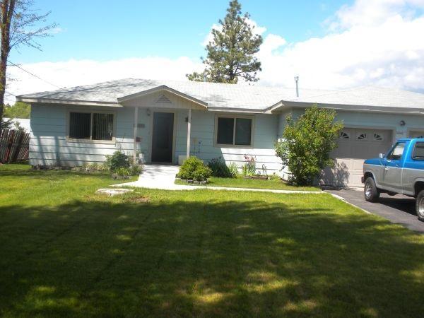Looking For Acreage Here In Town-here It Is! 3 Bedroom With 1 1/2 Baths On 1.45 Acres. Great Pasture Fenced. Nice Big Mature Trees With Fruit Trees. Lots Of Room For A Garden Area. Raspberry Bushes And Flowers. Come Take A Look!