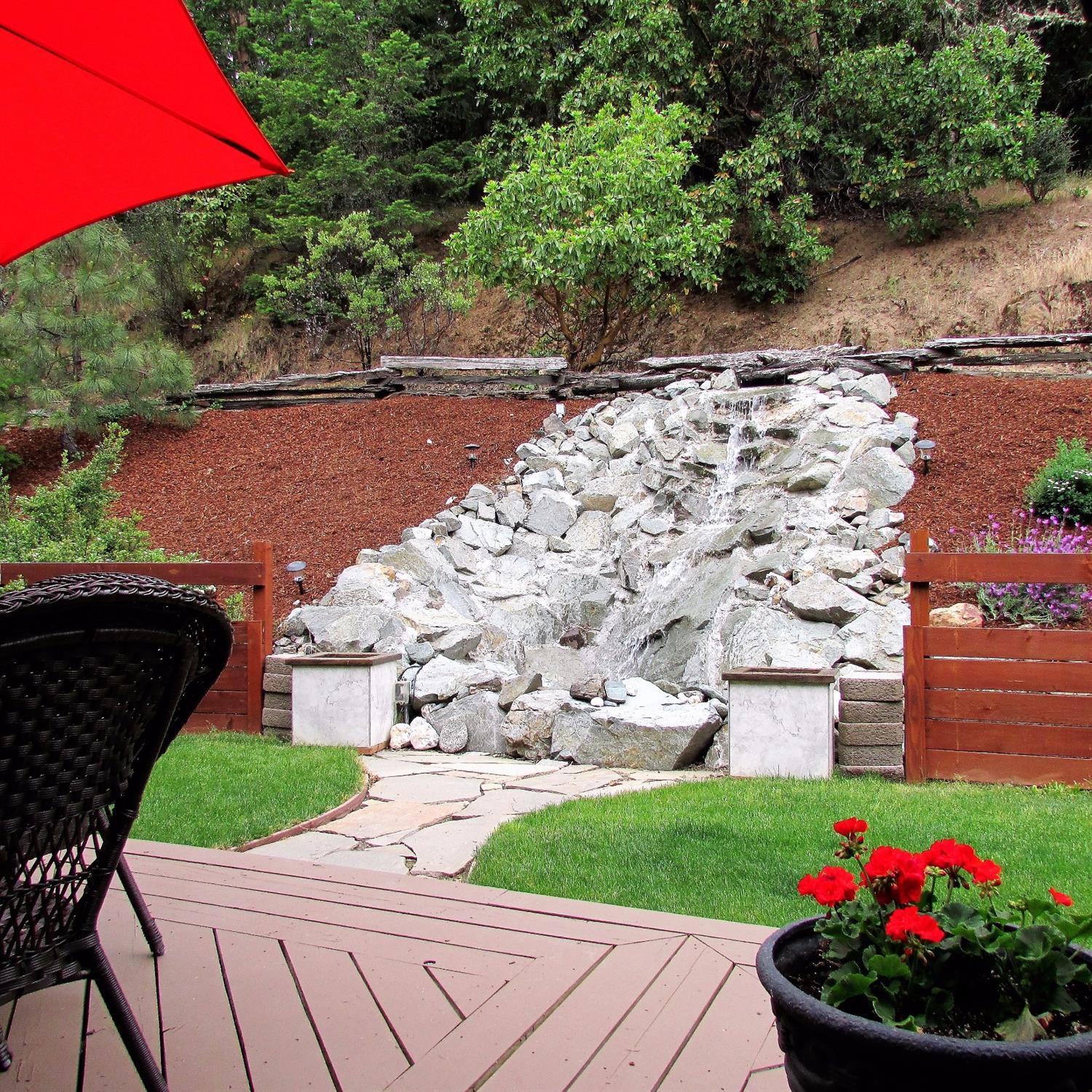 If you've been looking for property that's not too much work, has plenty of privacy, has all the amenities, with easy access in and out...and isn't too far out of town... this is the property for you! A beautiful remodeled home, inground pool, a stunning waterfall and it's all on a little over 5 acres of land. You'll love the variety scenery ~ pasture, woods... wildlife and more! Your also conveniently located to wonderful wineries, historic Jacksonville and Applegate lake. Call for an appt, today ~ this property won't last long!